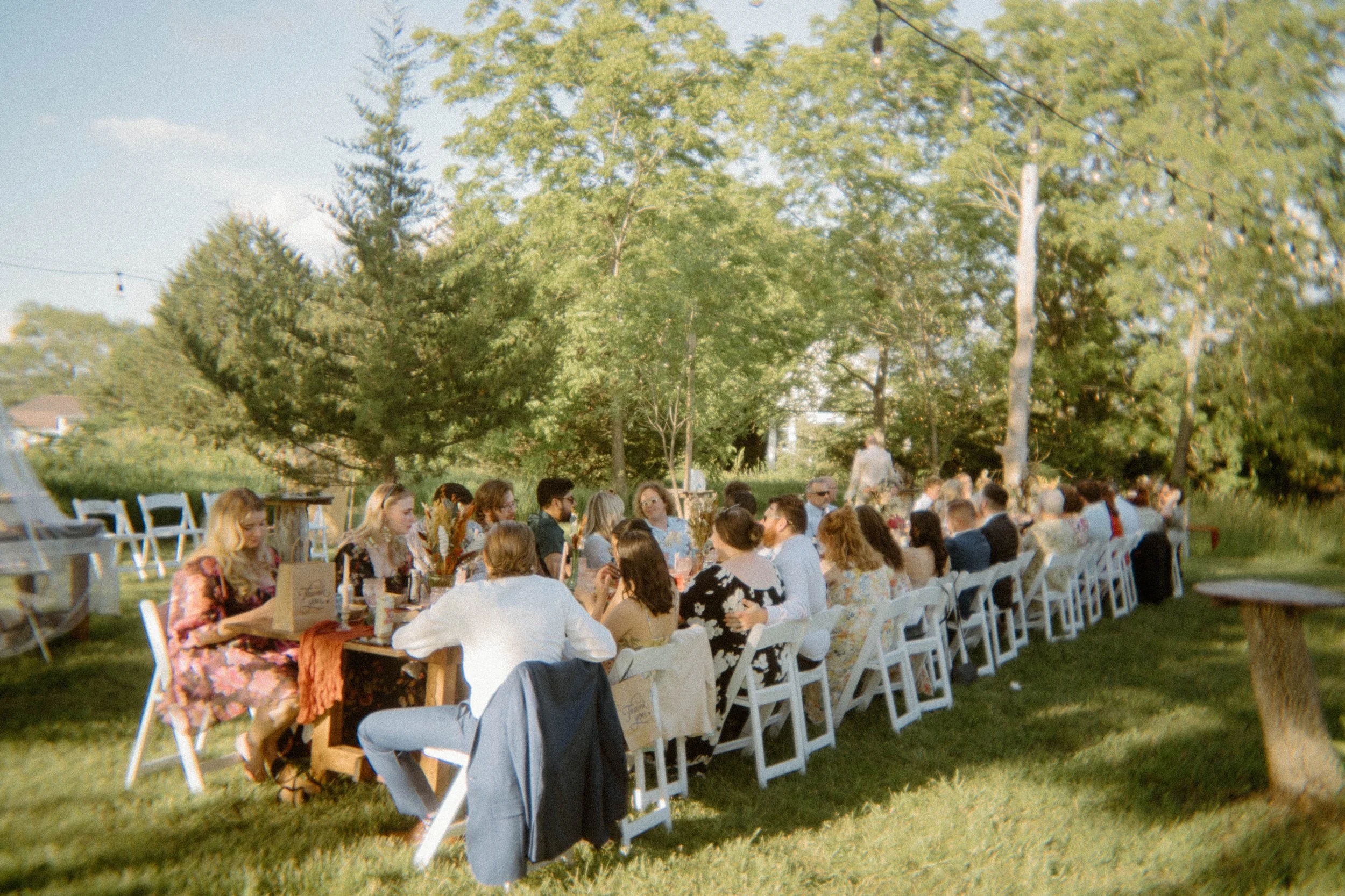 Grass & Tree Table Reception Area
Approx. 20 × 60 ft | An outdoor area surrounded by trees and mini tables crafted from the land itself. This space naturally draws guests for conversation, lounging, and late-evening moments near the fire pit. Easy ac