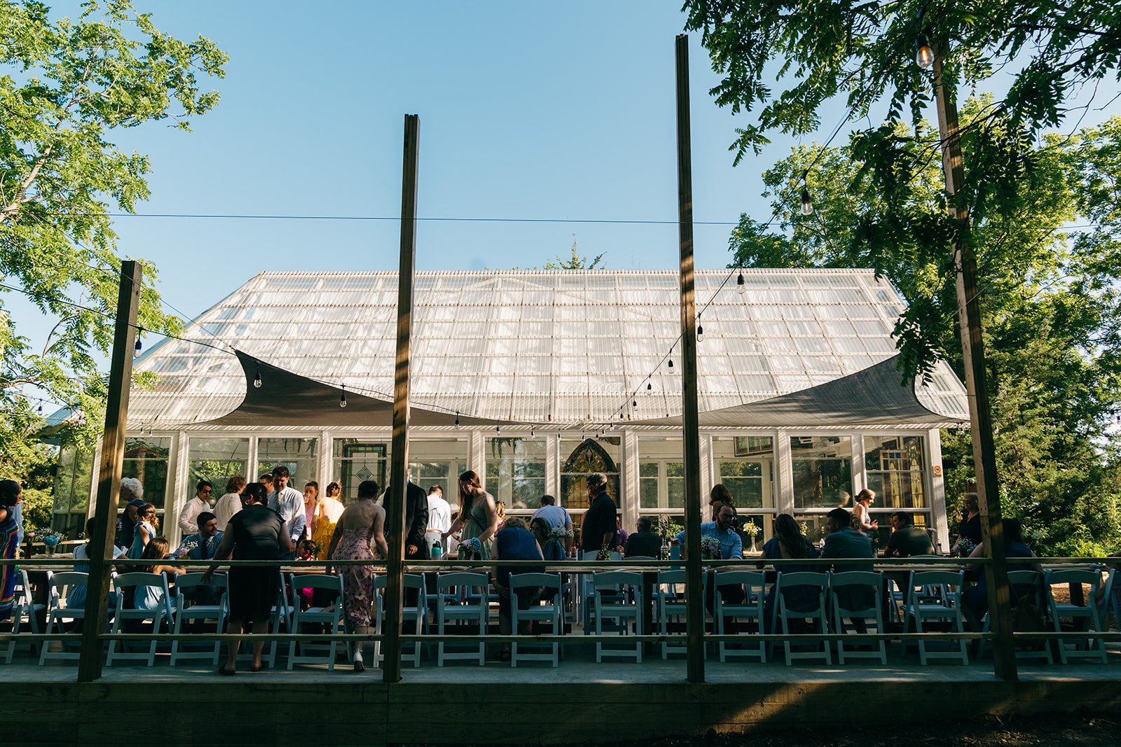 Concrete Reception Area (North Side)
20 × 44 ft | An open concrete space adjacent to the conservatory. With windows open, guests can still see and hear the music while mingling, cooling off, or stepping out without leaving the celebration.
