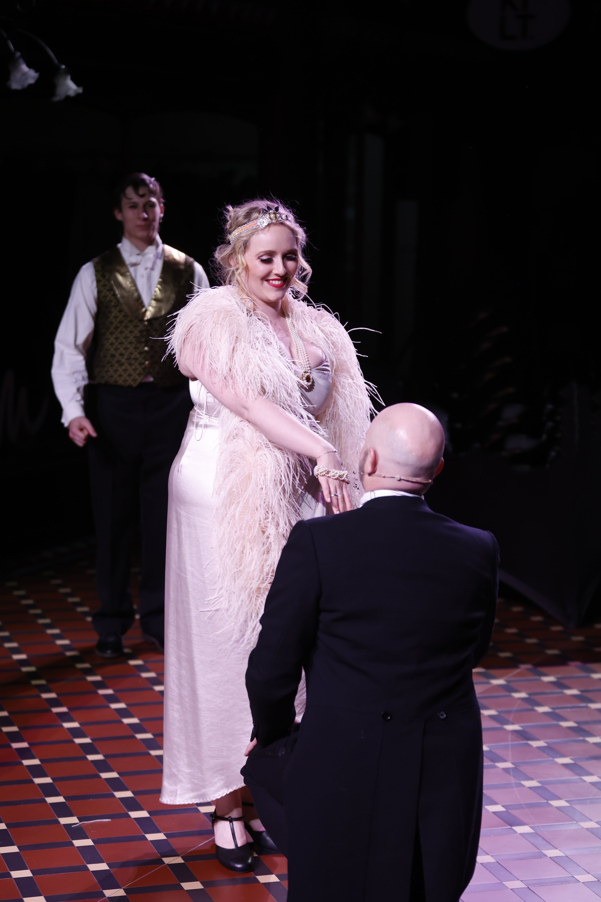 Jack Mould (Njegus), Matilda Wickbom (Hanna Glavari), and Andrew Grenon (Danilo)