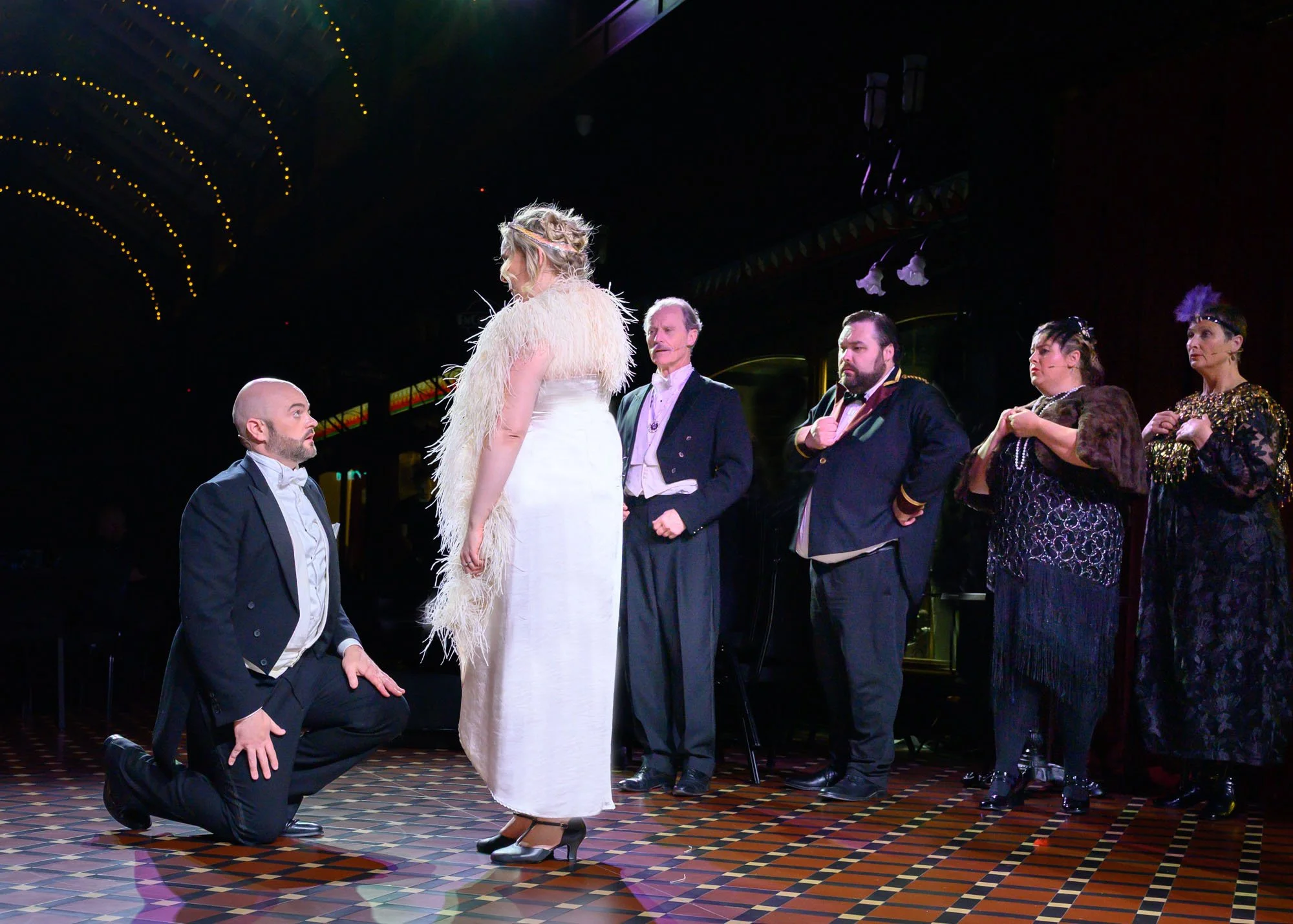 A proposal! - Andrew Grenon (Danilo), Matilda Wickbom (Hanna), Warwick Shillito (Baron Zeta), David Moseley (Kromov), Emma Summers (Olga), and Louisa Pilkington (Praskovia)