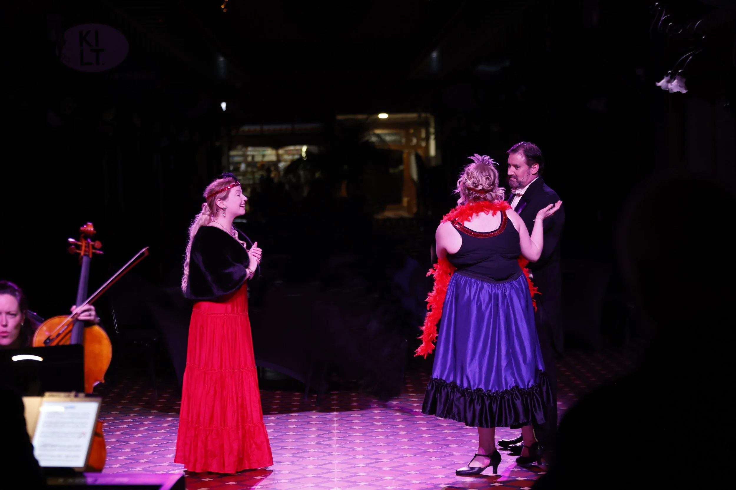 Katherine Doig (Valencienne), Matilda Wickbom (Hanna Glavari), and Nigel Withington (Camille de Rosillon)