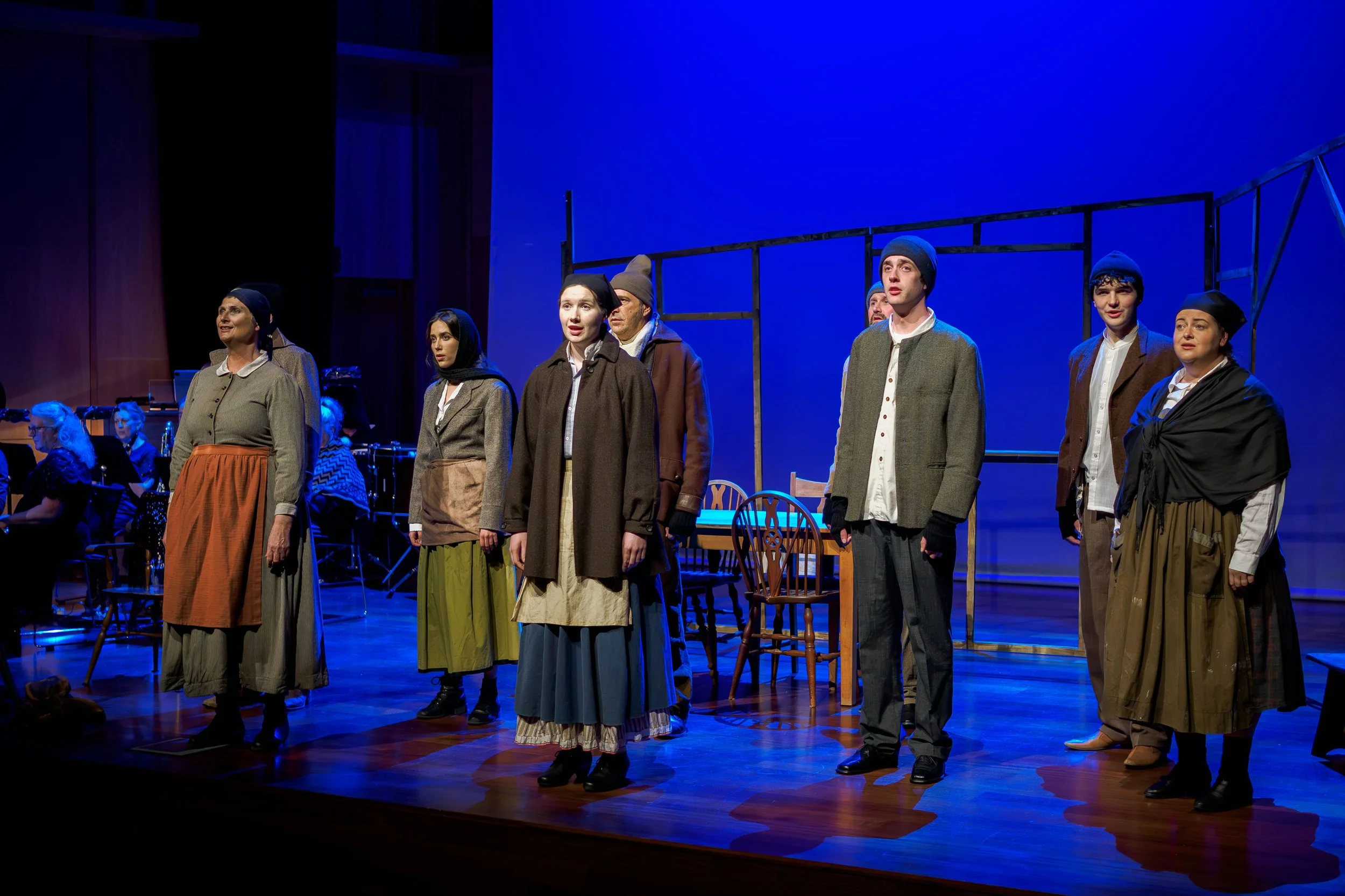 Full company performs 'The Moon is Distant from the Sea' by David Hamilton, accompanied by Matthew Oswin