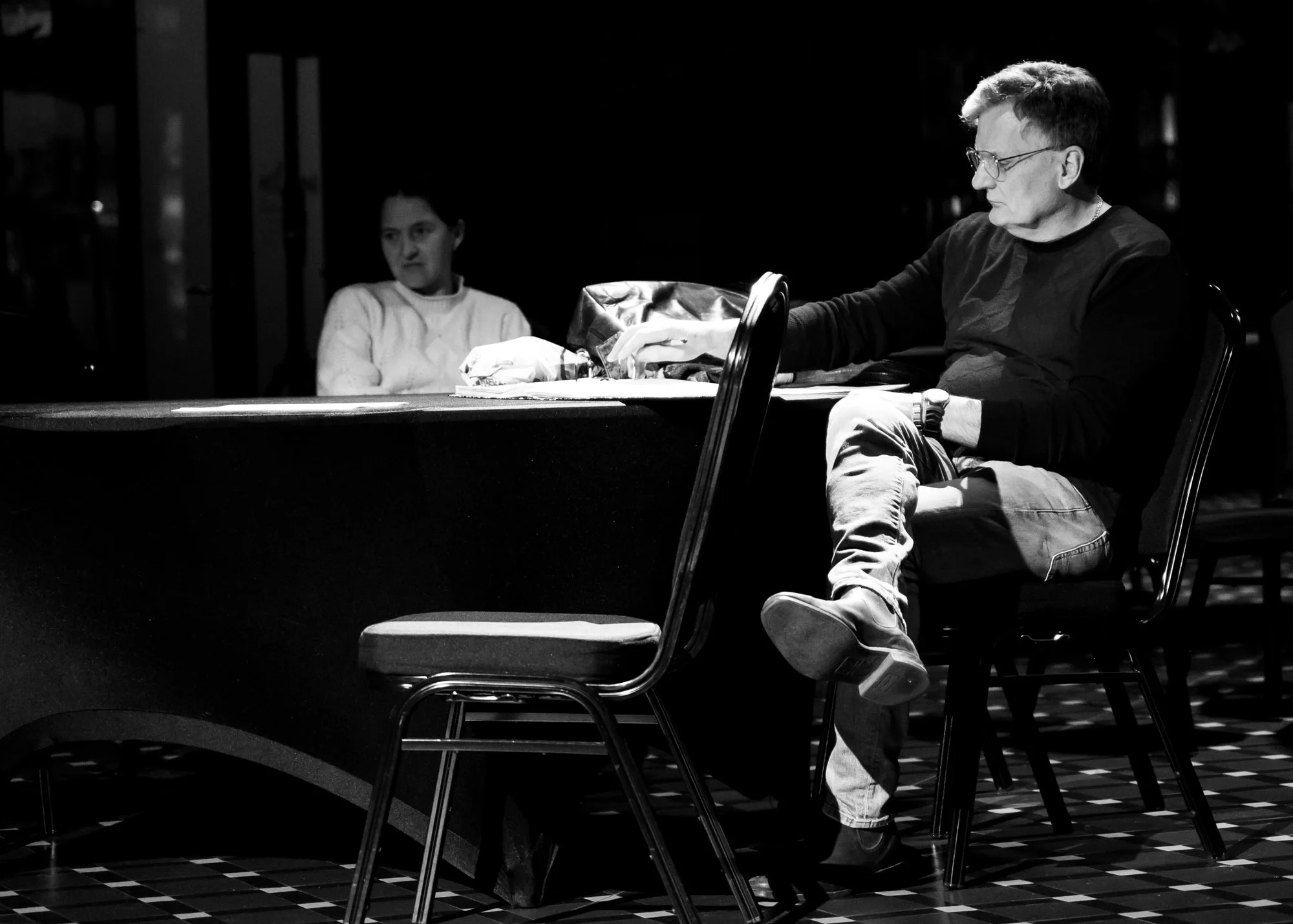 Cover repetiteur Anria Breytenbach (L) and director Julian Anderson (R) taking notes at the general dress rehearsal for 'The Merry Widow' 