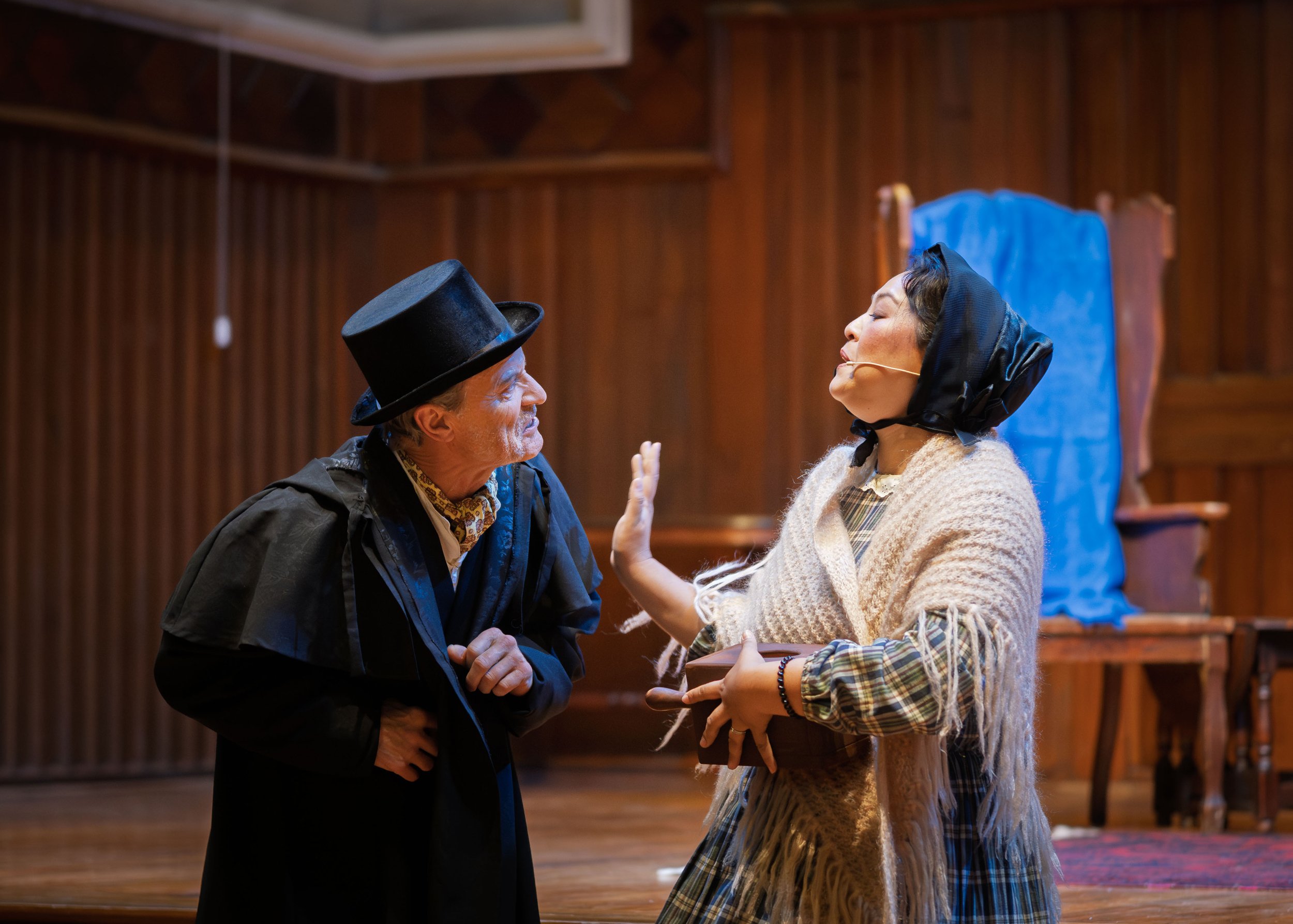 Warwick Shillito (Scrooge) & Jamie Hart (Mrs. Cratchit)