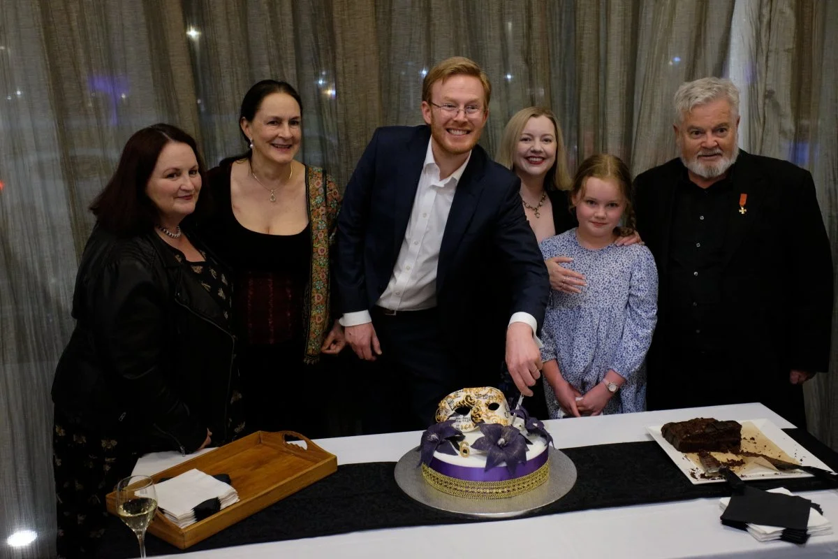 Toi Toi Opera co-founders, directors, board members, and patron, with one of our littlest stars, cutting one of the spectacular birthday cakes made for us by the wonderful Fiona Taylor.

(Julian Anderson our fellow board member was sadly unable to at