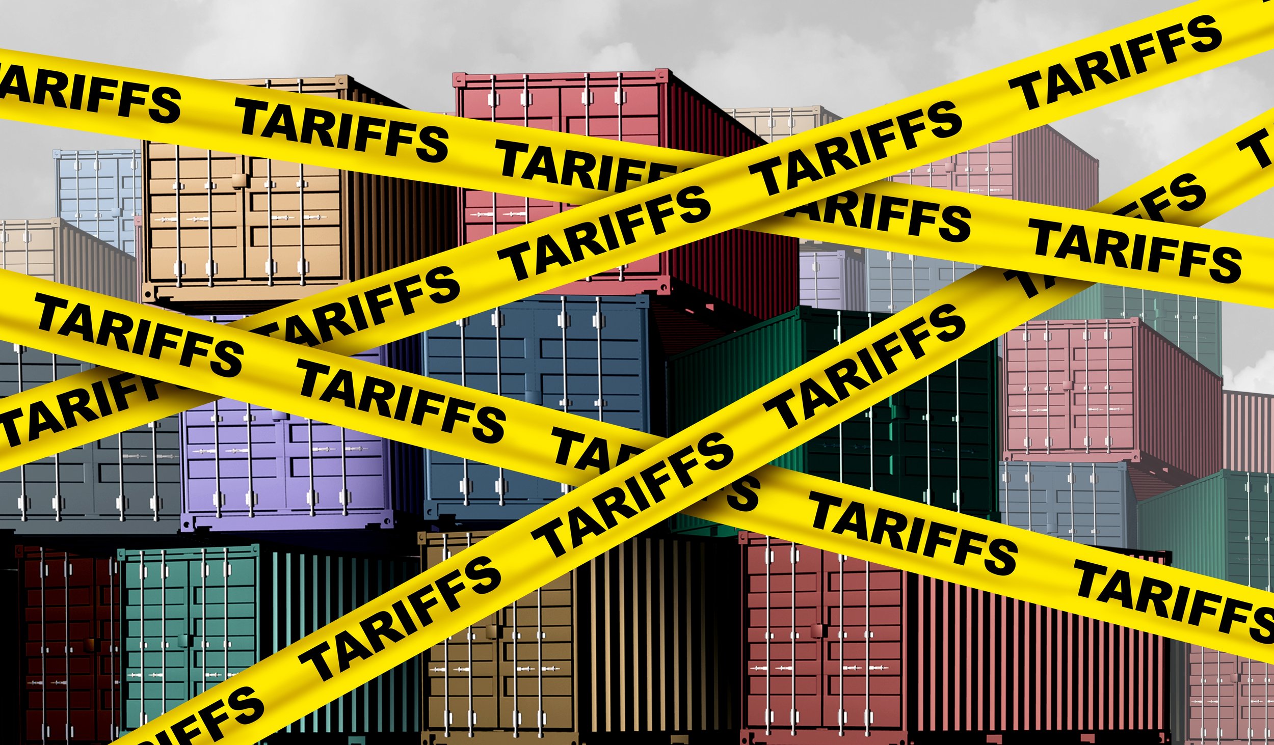 A large pile of shipping containers blocked by crisscrossing yellow tape with the word 'Tariffs' printed on it.