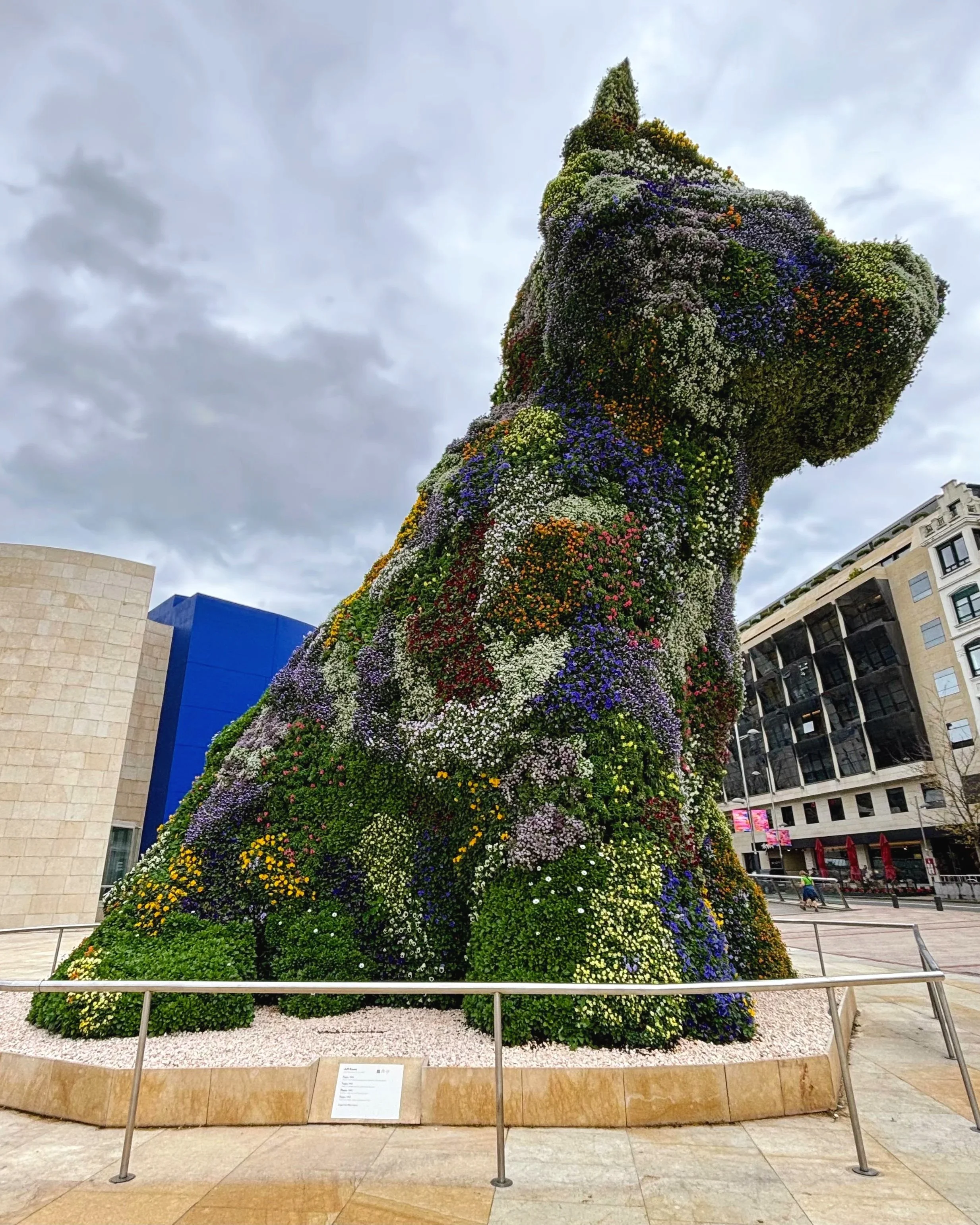 Puppy by Jeff Koons, guarding the entrance to Guggenheim Bilbao, is the world's largest flower sculpture