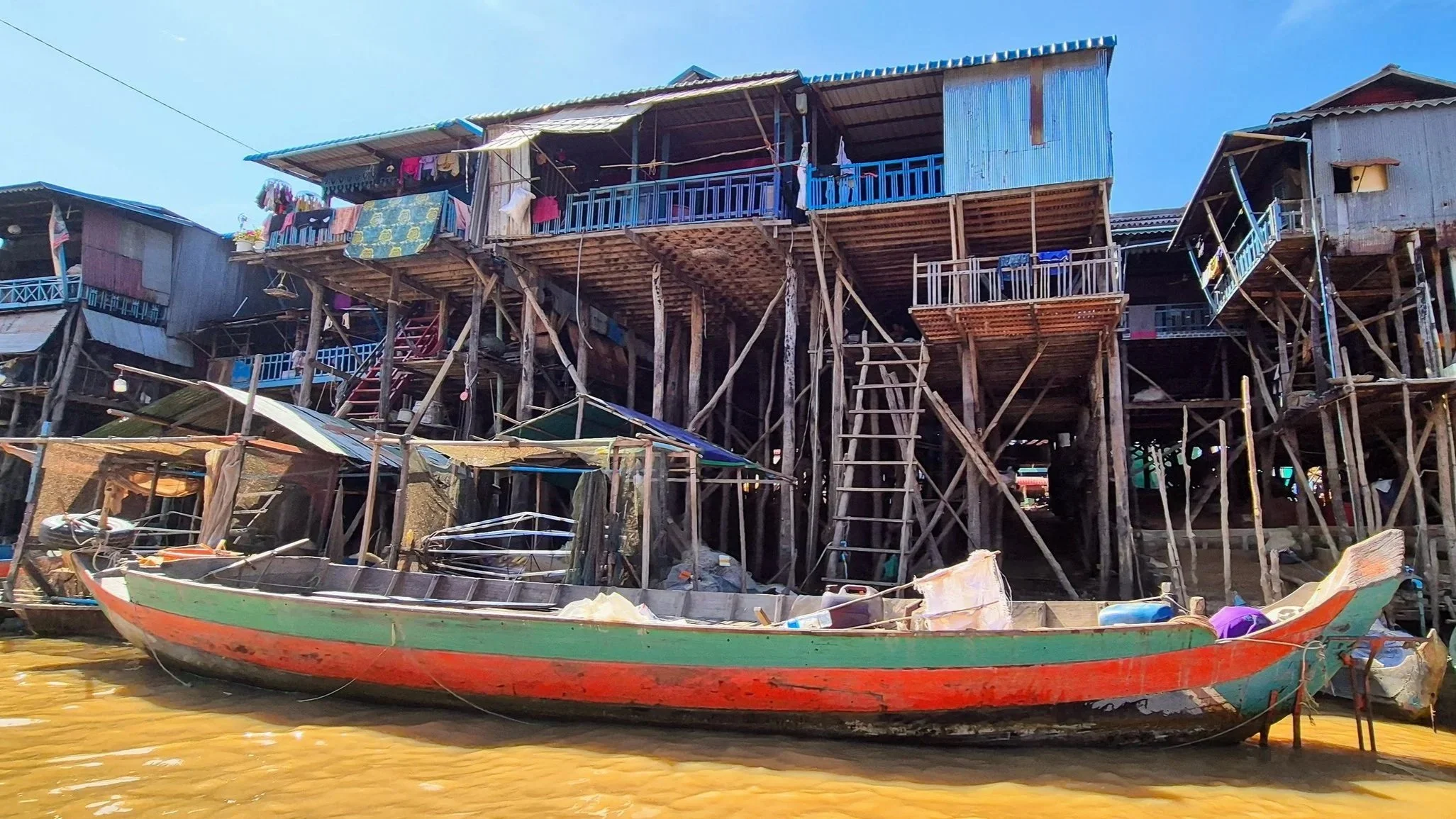 stilted houses in Kampong Phluk Cambodia during the dry season