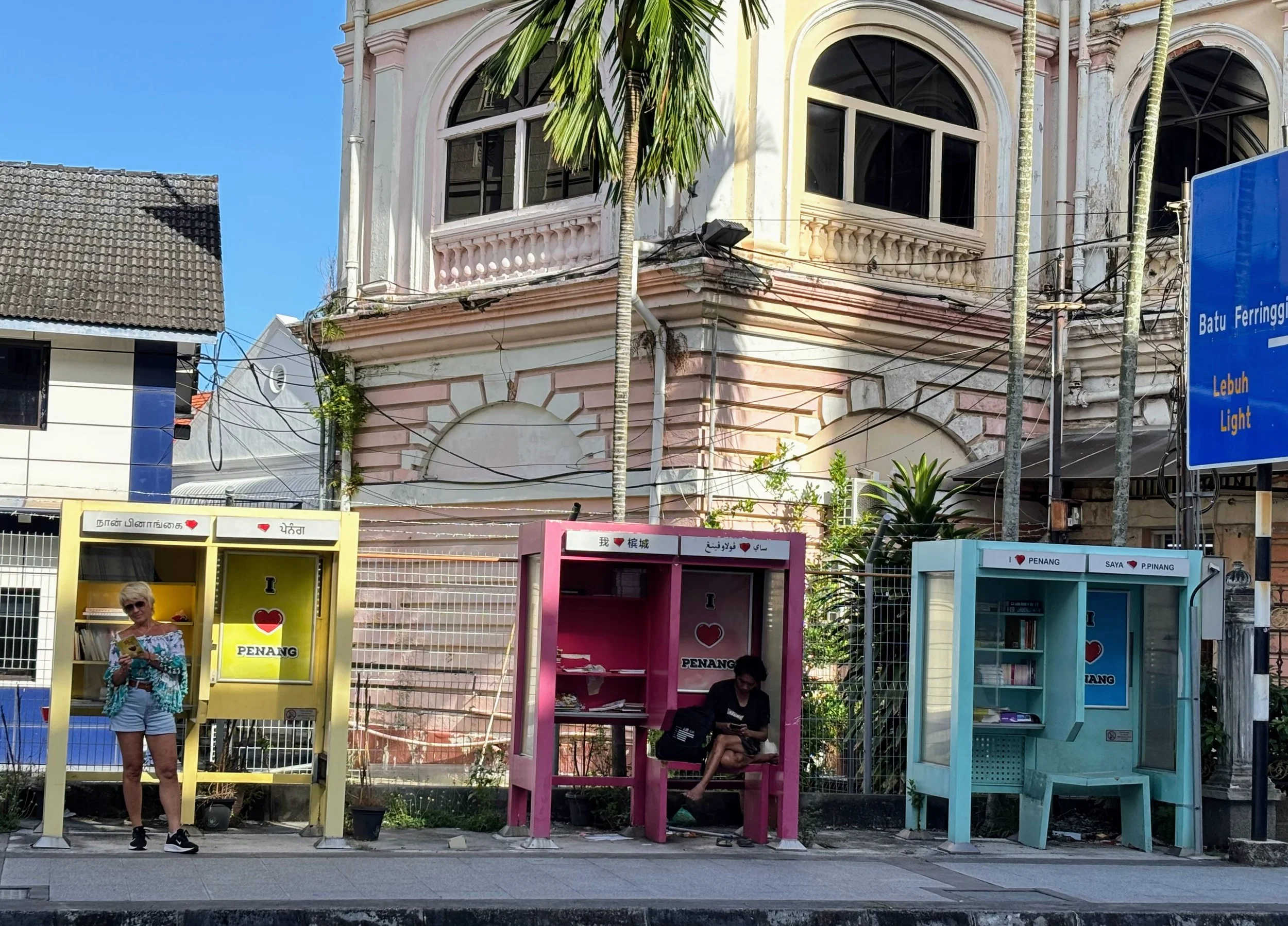 Abandoned phone booths turned into little street libraries in George Town Penang Malaysia