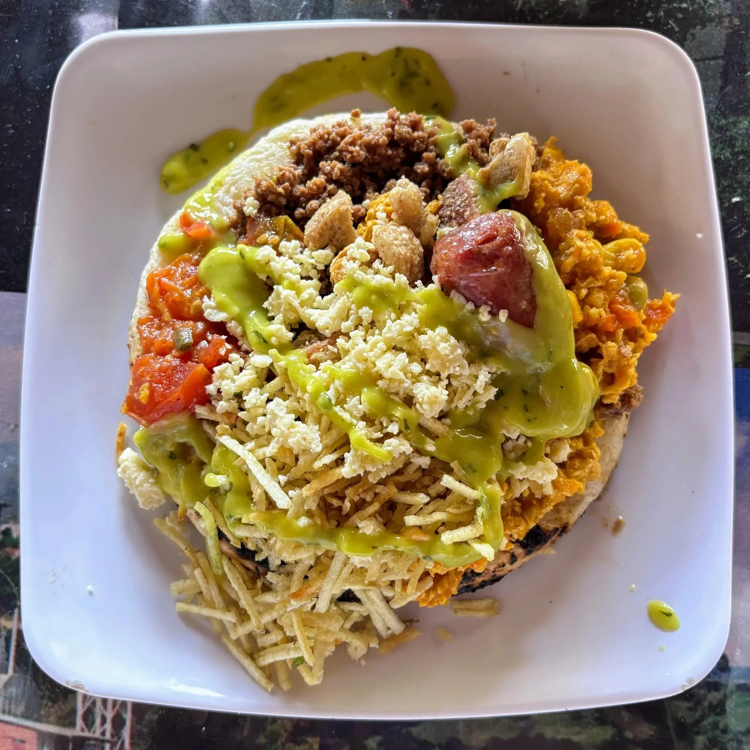 An arepa with everything, meat, cheese etc in Medellin Colombia