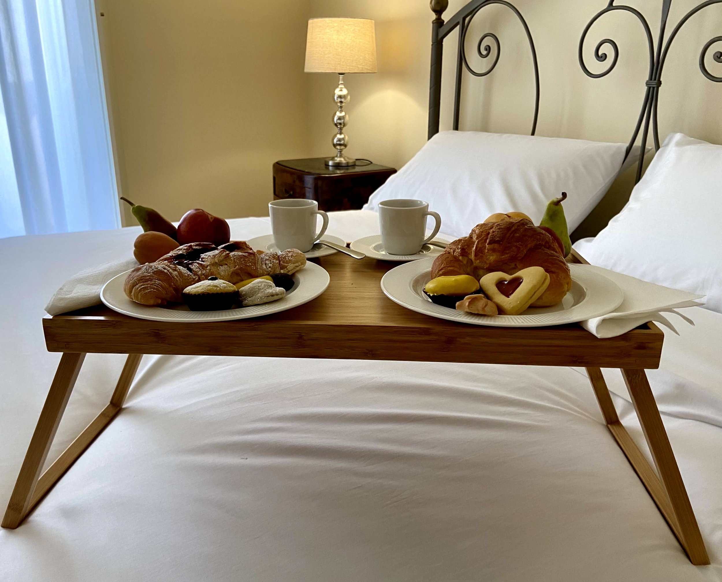 Room service breakfast tray with sweet delicacies