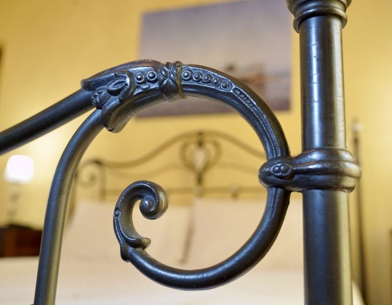Design detail of Liberty style cast iron bed