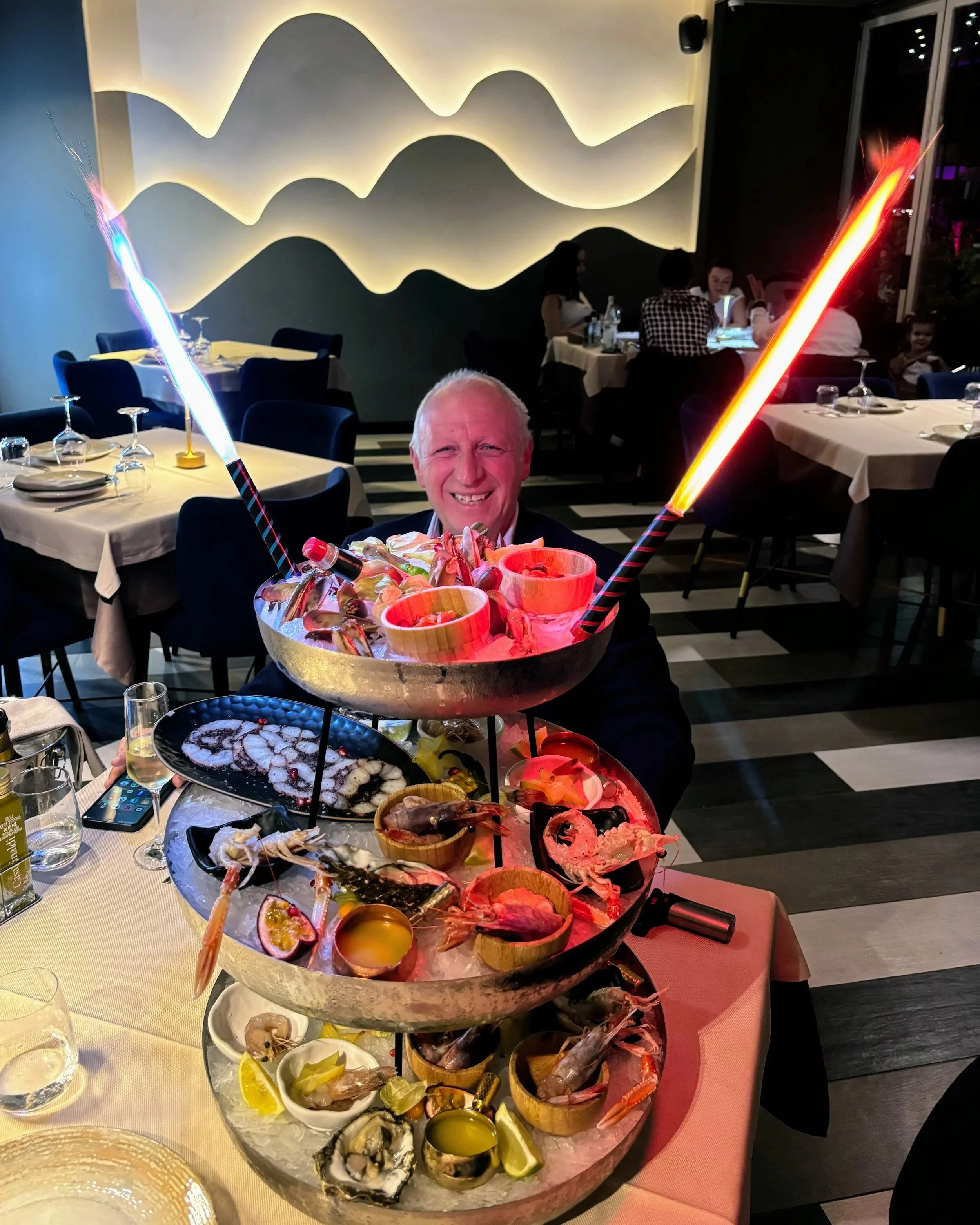 Umberto behind a huge three-level platter of raw seafood at Paradise Beach restaurant in Vlore, Albania