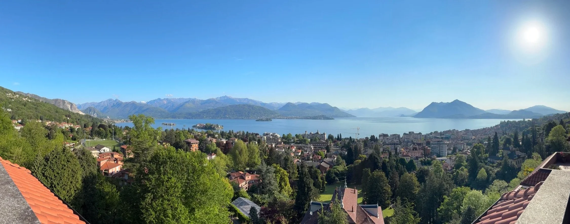 Panoramic view of Lago Maggiore in Italy taken from a terrace above the city on a sunny day