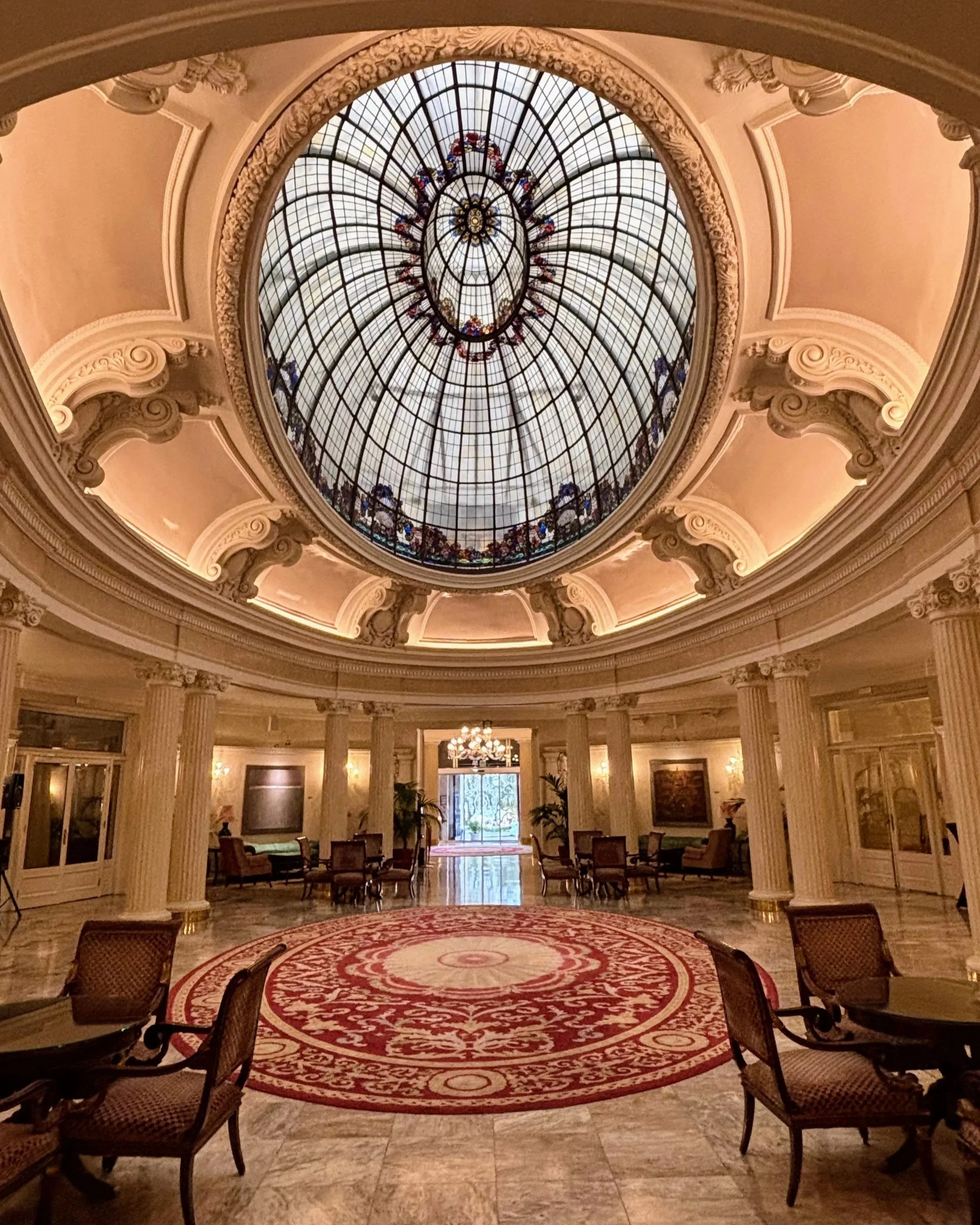 the lobby at Hotel Carlton in Bilbao, featuring interiors in 'beaux arts' style
