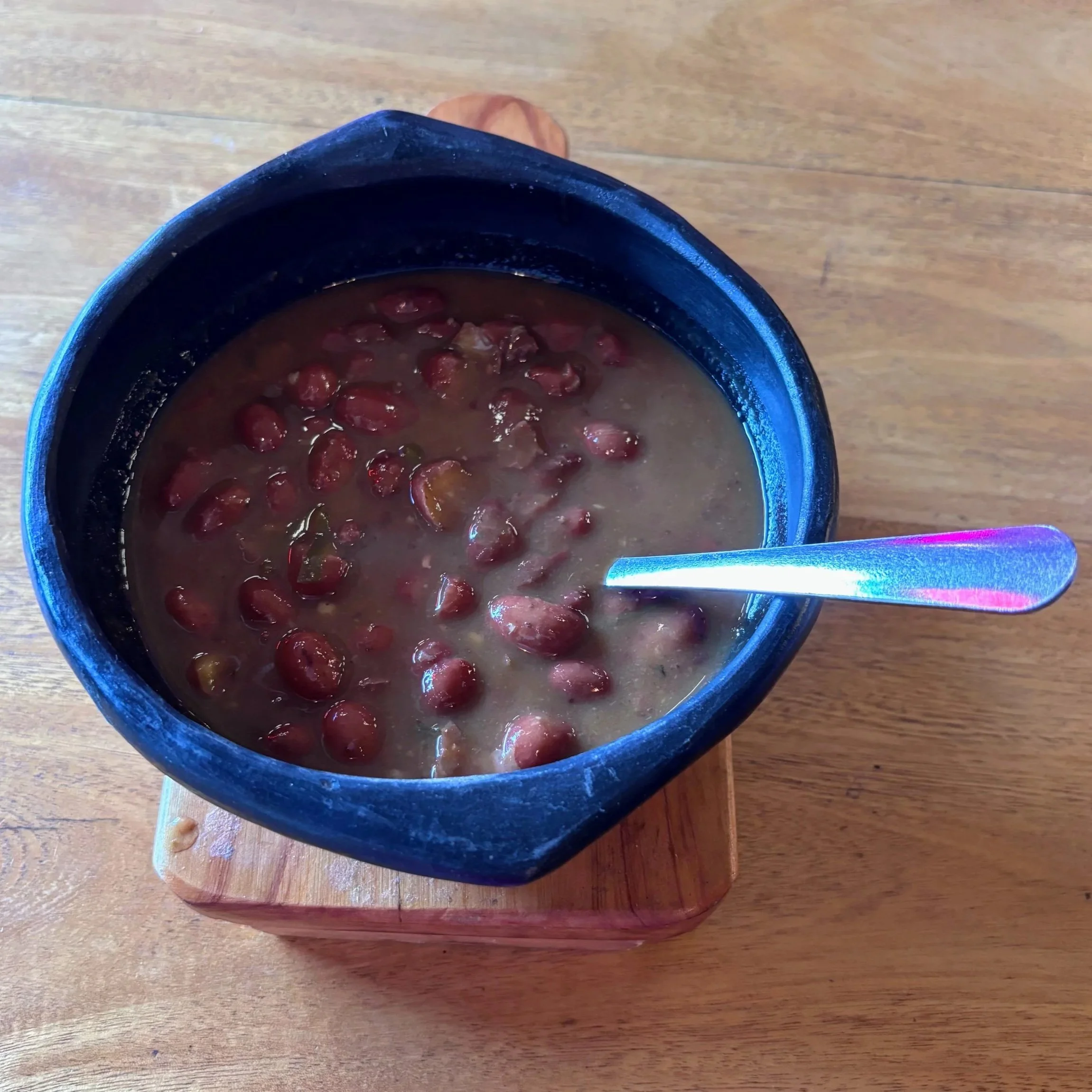 a bowl of frijoles red bean soup in Medellin Colombia