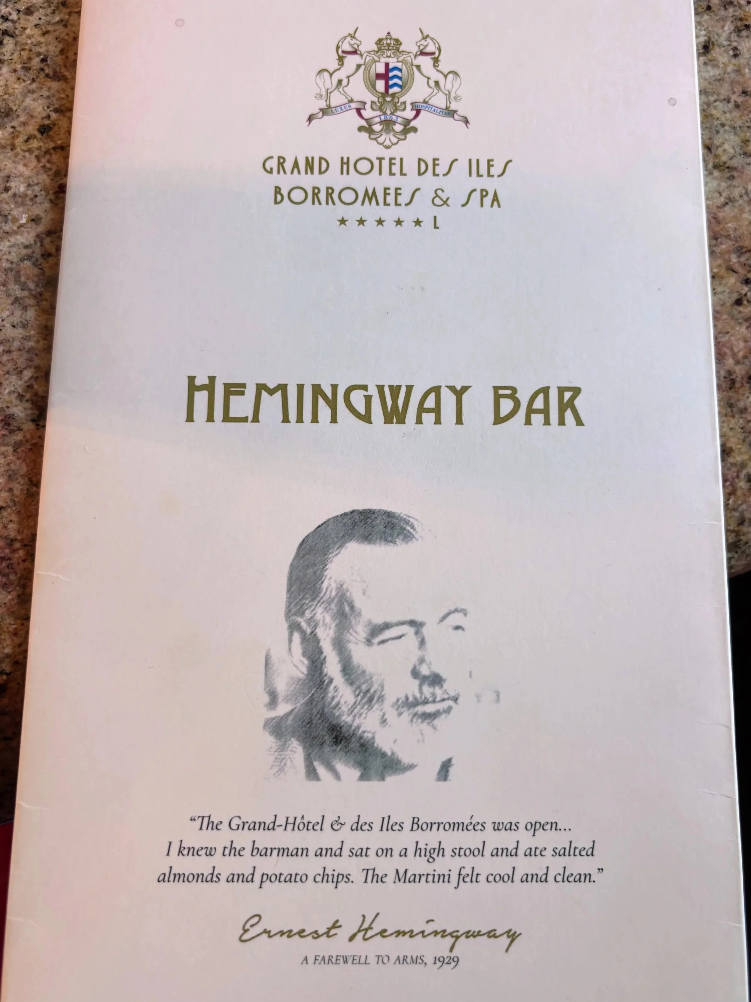 Drinks menu with Hemingway's picture and quote at the bar of Grand Hotel des Iles Borromées Stresa Italy