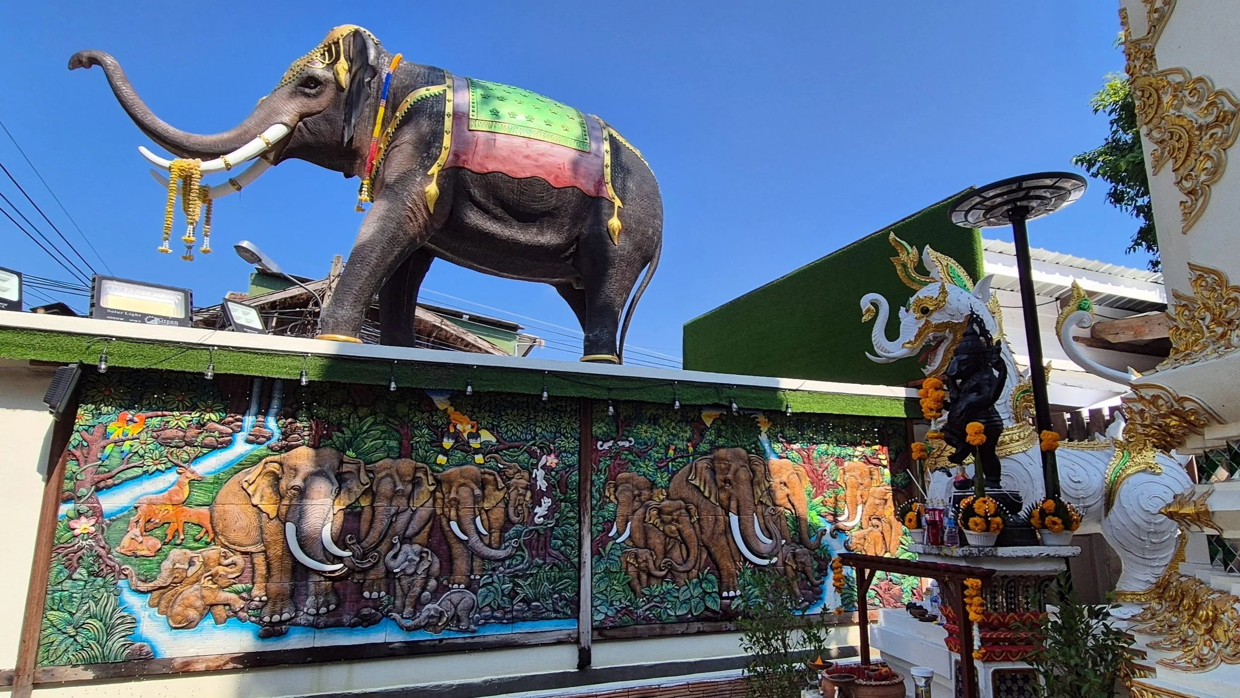 Elephant statue and art work at Chiang Mai temple in Thailand