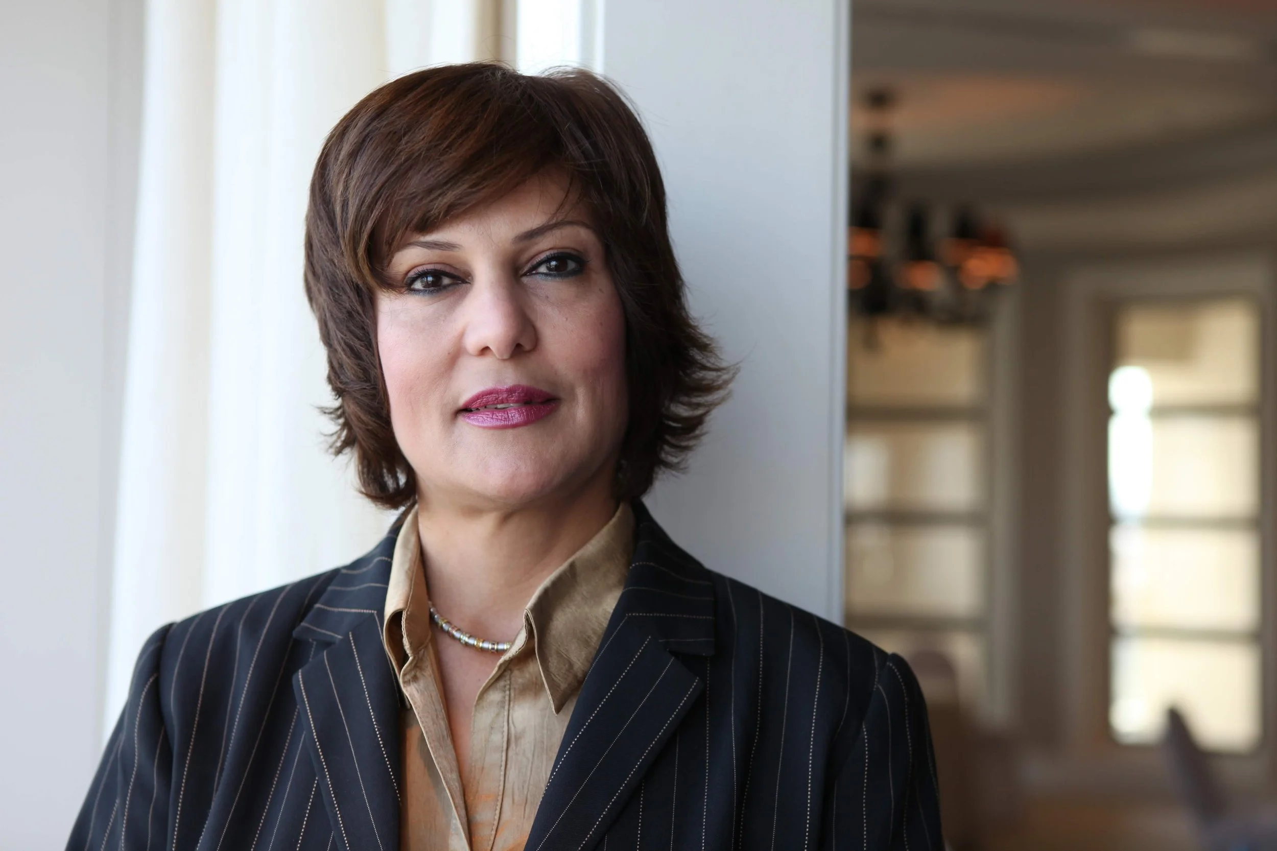 A profile photograph of Salwa Bugaighis