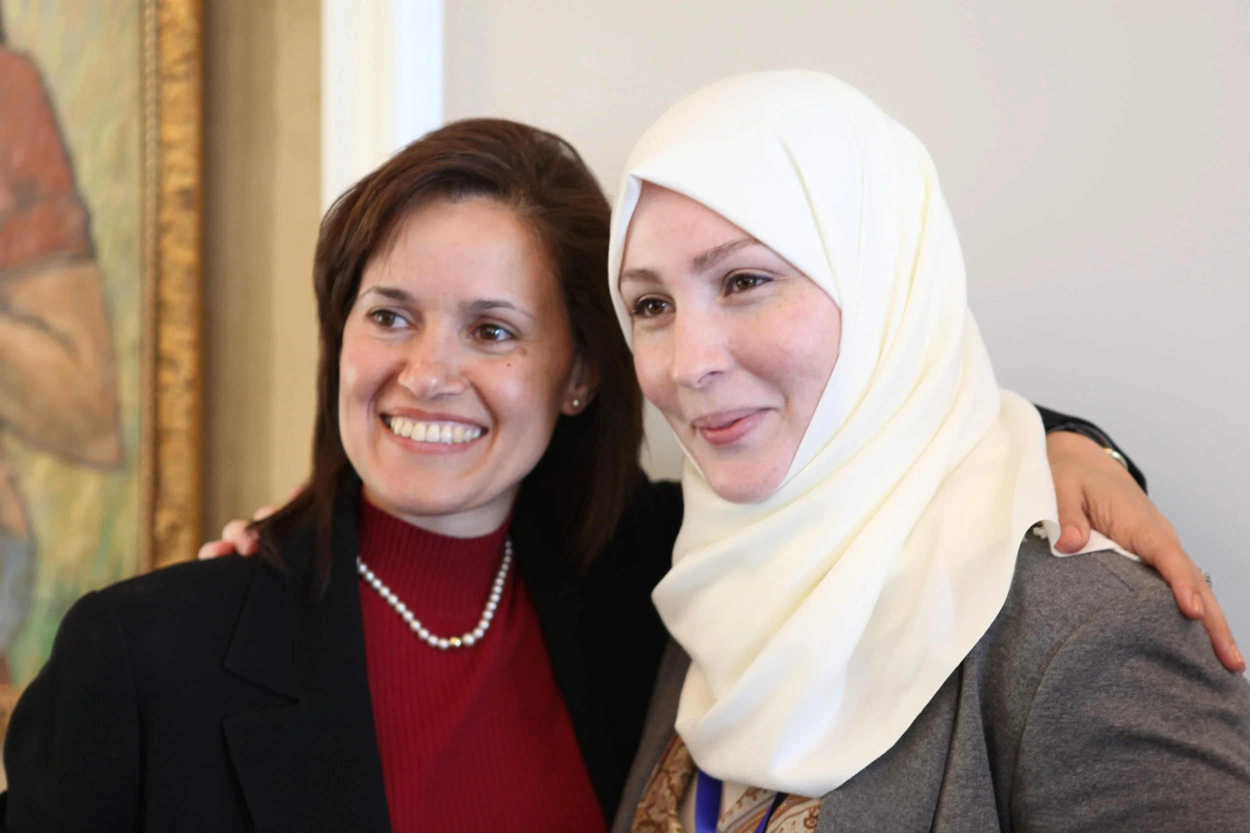 Two women posing for a photograph