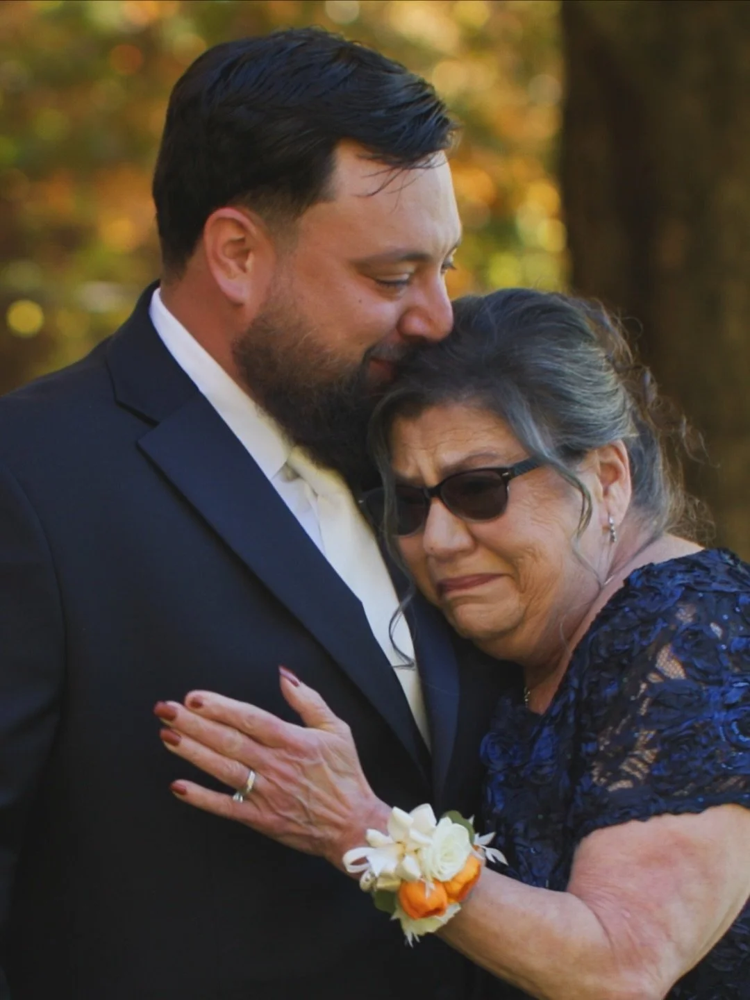 The 5 wedding moments you&rsquo;ll never see, unless they&rsquo;re on film

The couple is in the middle of it all on their wedding day, so some of the best moments happen just out of their view. These four frames show what we mean.

First, a hug outs