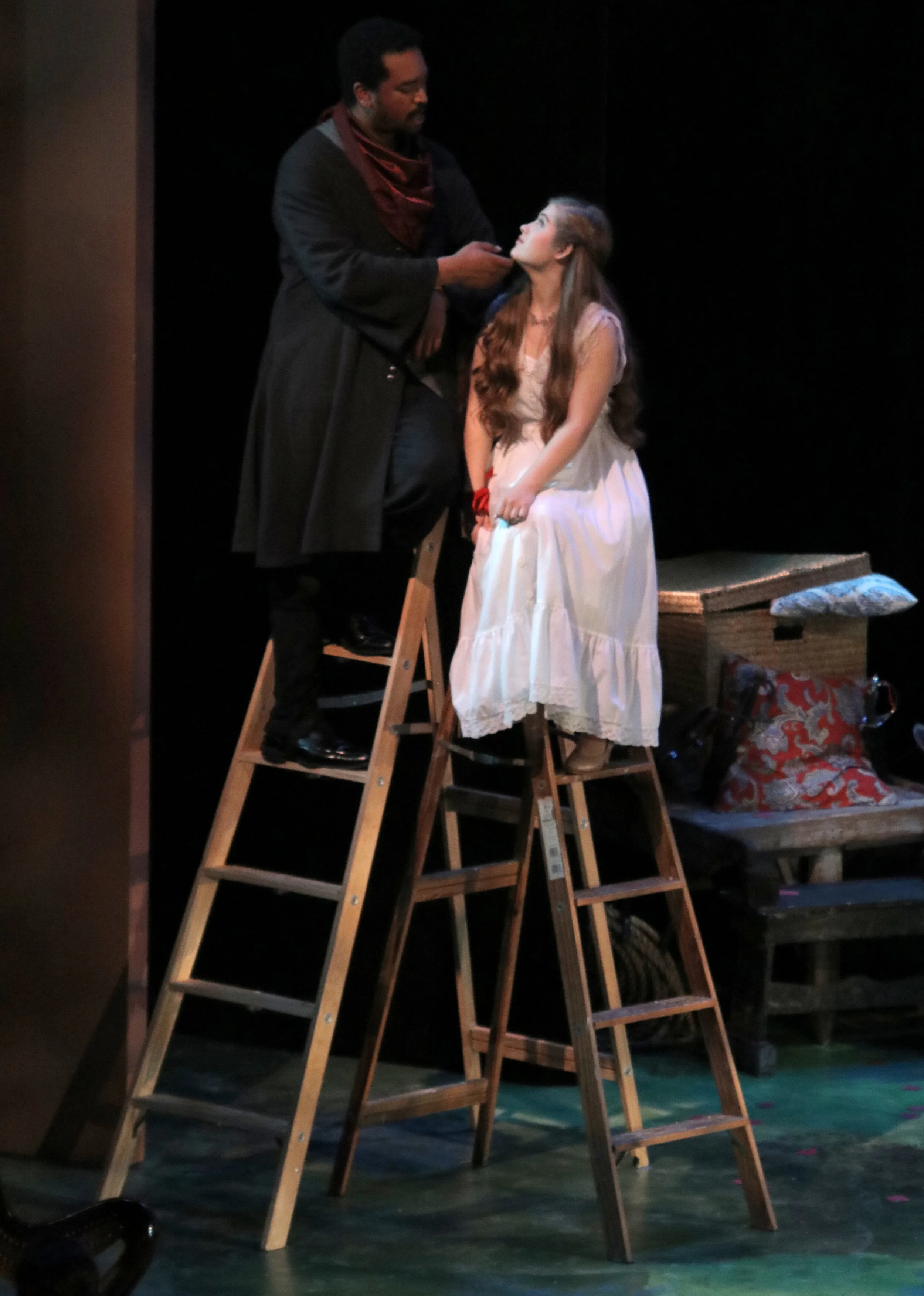 Michael Blackburn as El Gallo and MacKenna Wilson as Luisa in "The Fantasticks" at MPC Theatre Company. 