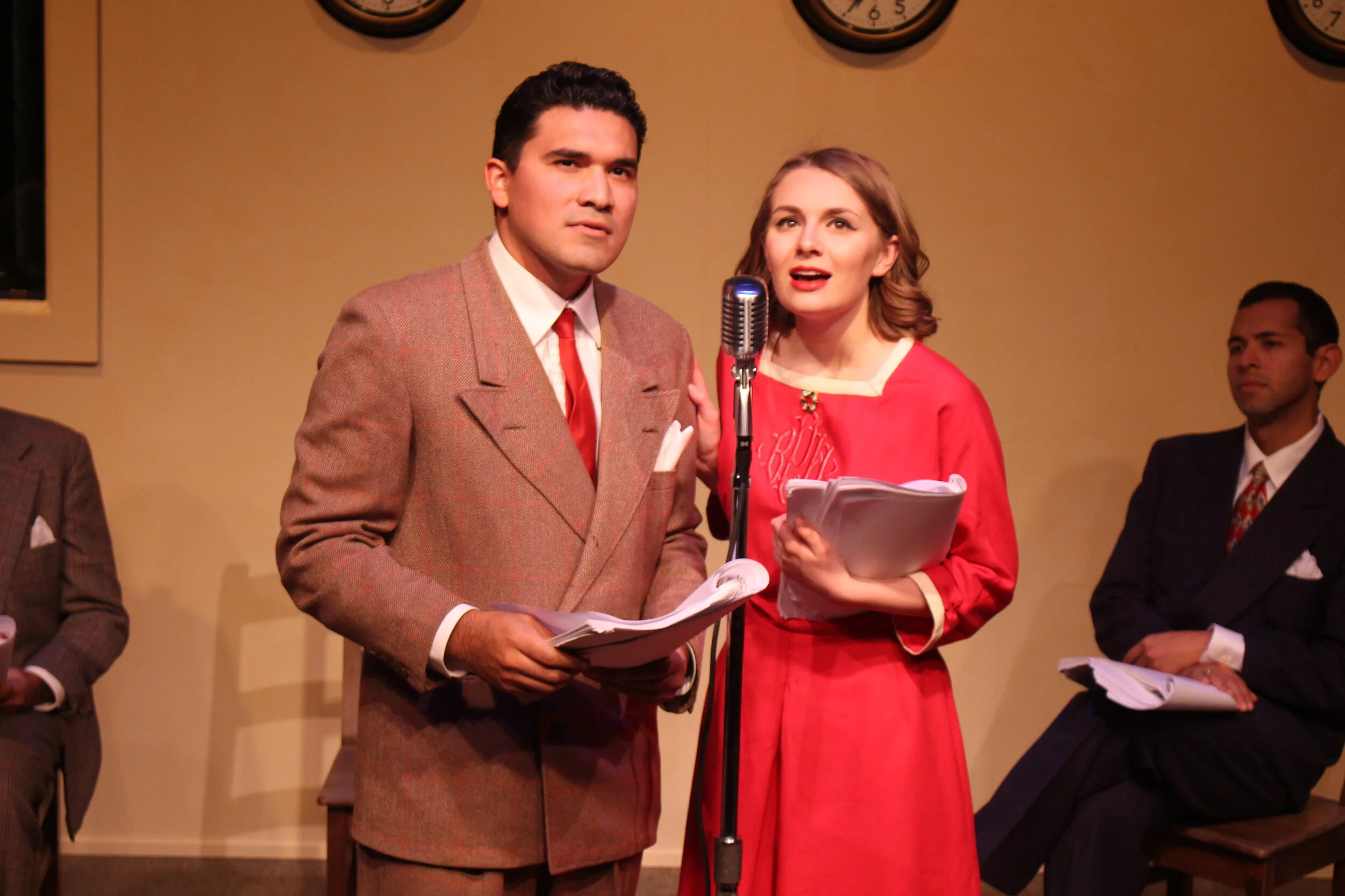 Andres Mercado as George Bailey and Kiana Sorenson as Mary Bailey in "It's a Wonderful Life: A Live Radio Play" at MPC Theatre Company.