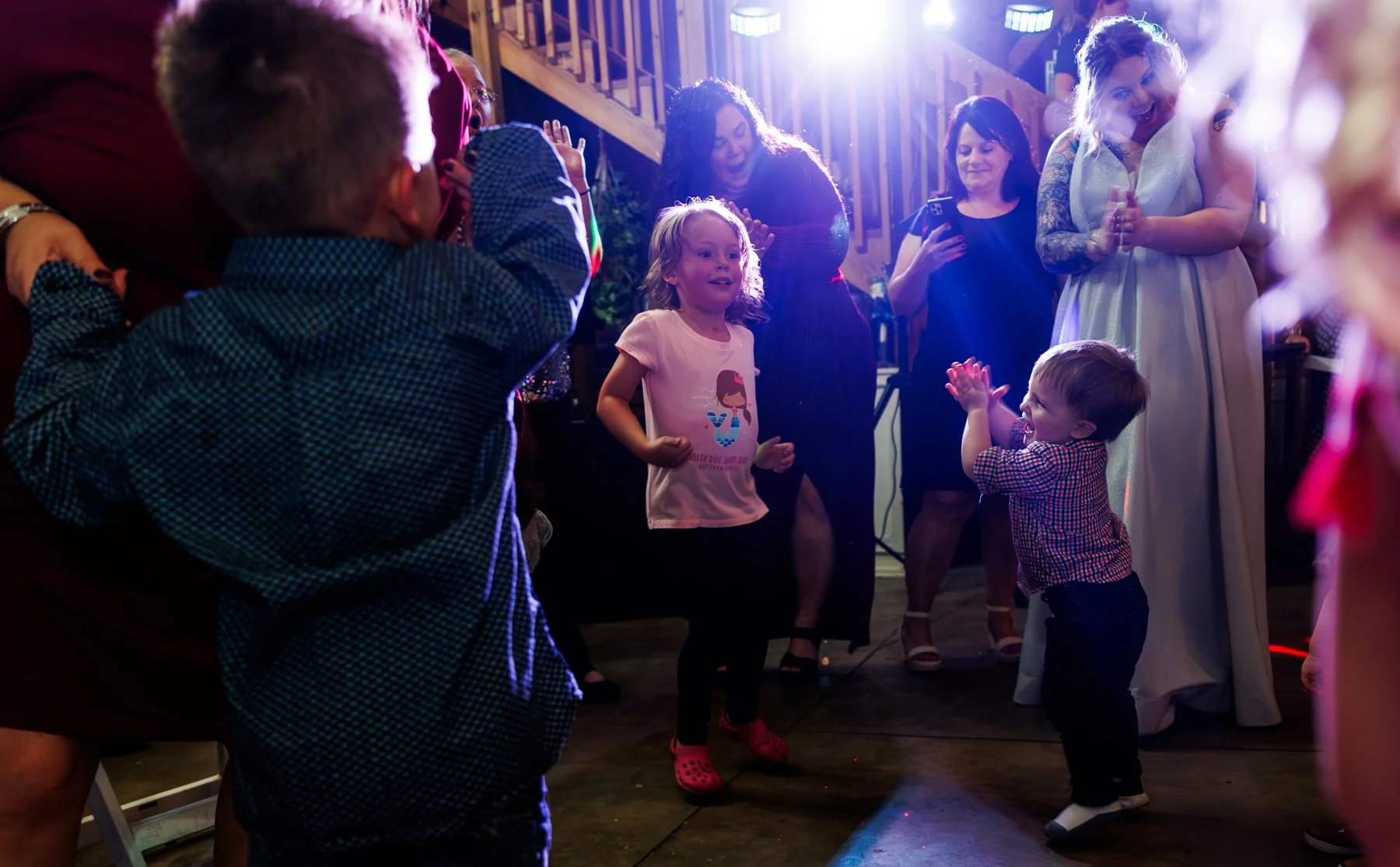 Kids at a wedding reception.