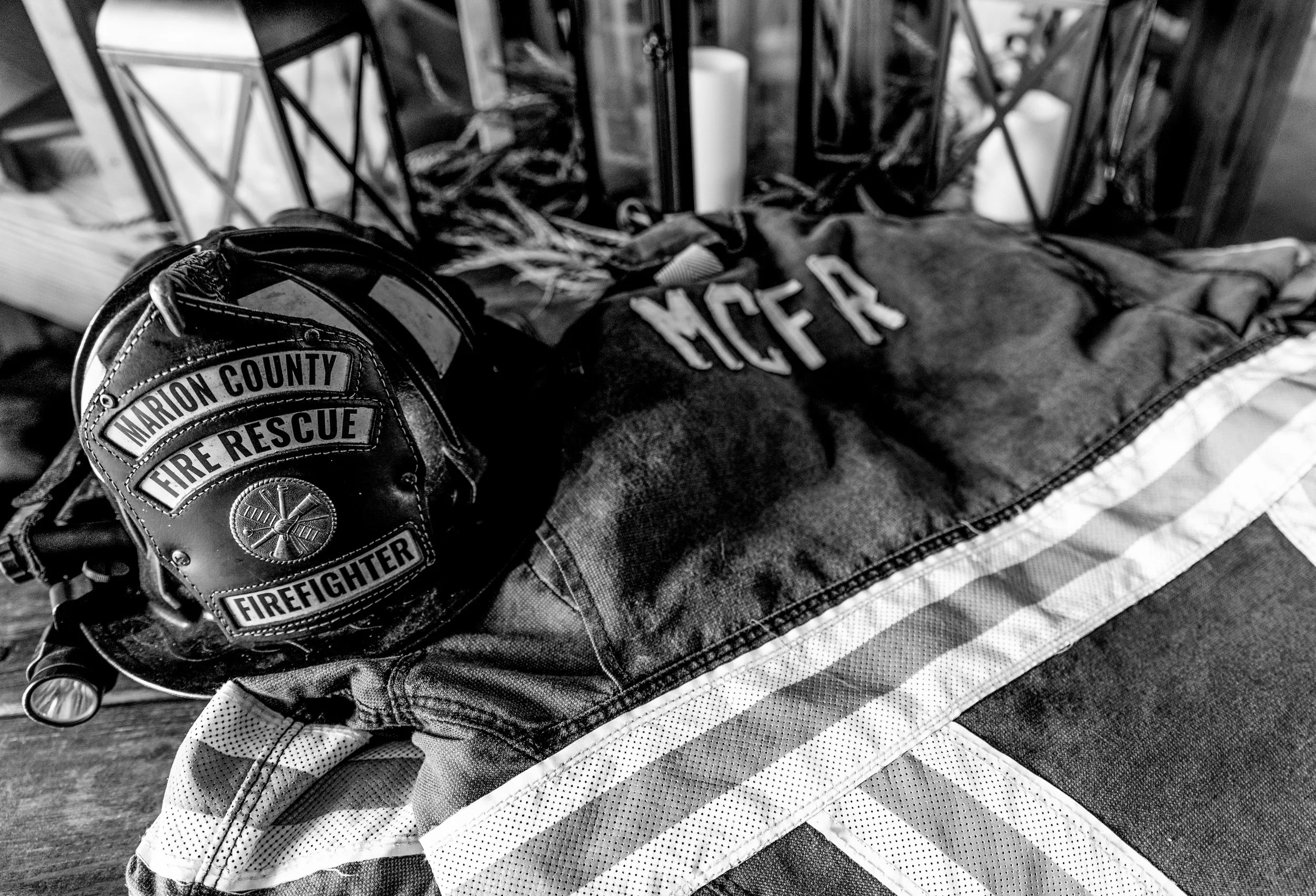 For the decor at Justyn and Maddie's wedding they put out their firefighter helmet and jacket.