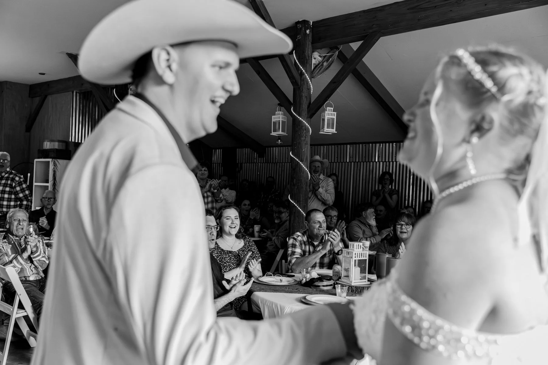 The groom and bride face each other after entering the reception.