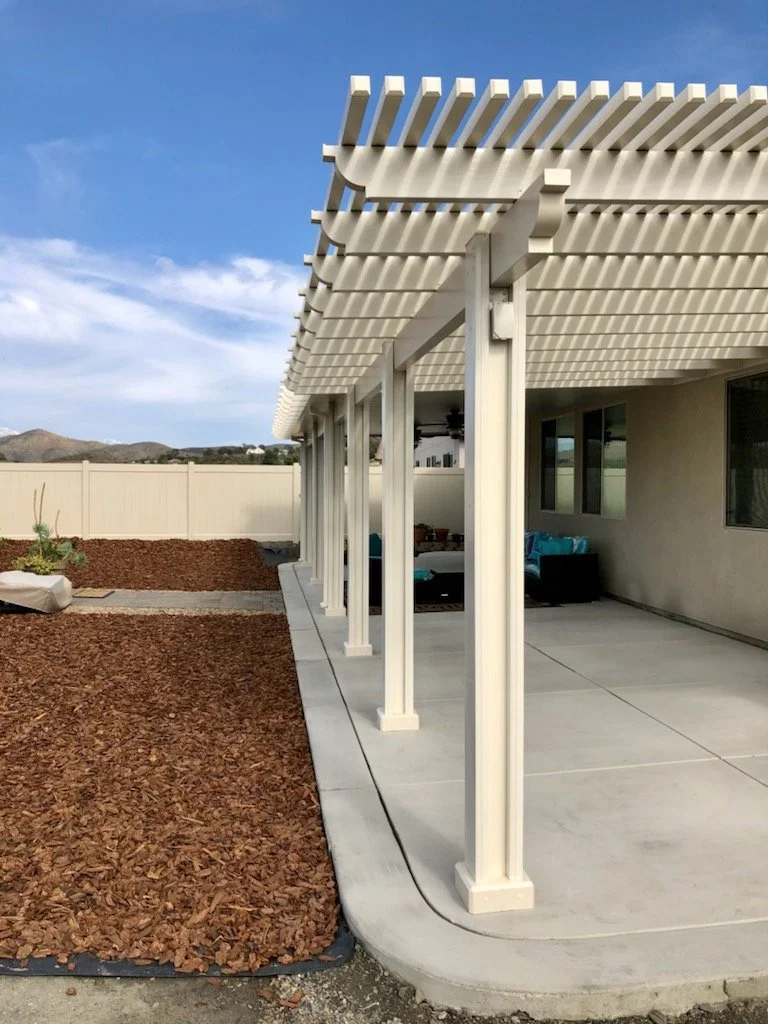 Lattice patio cover with header beams instead of traditional end styles