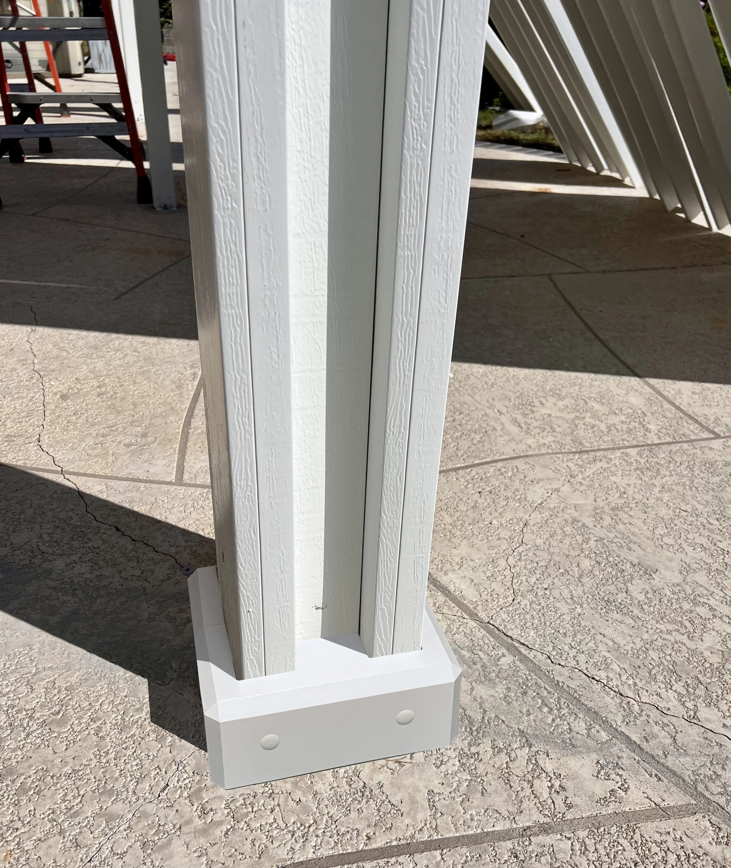 Alumawood patio cover post base with an AlumaBase installed