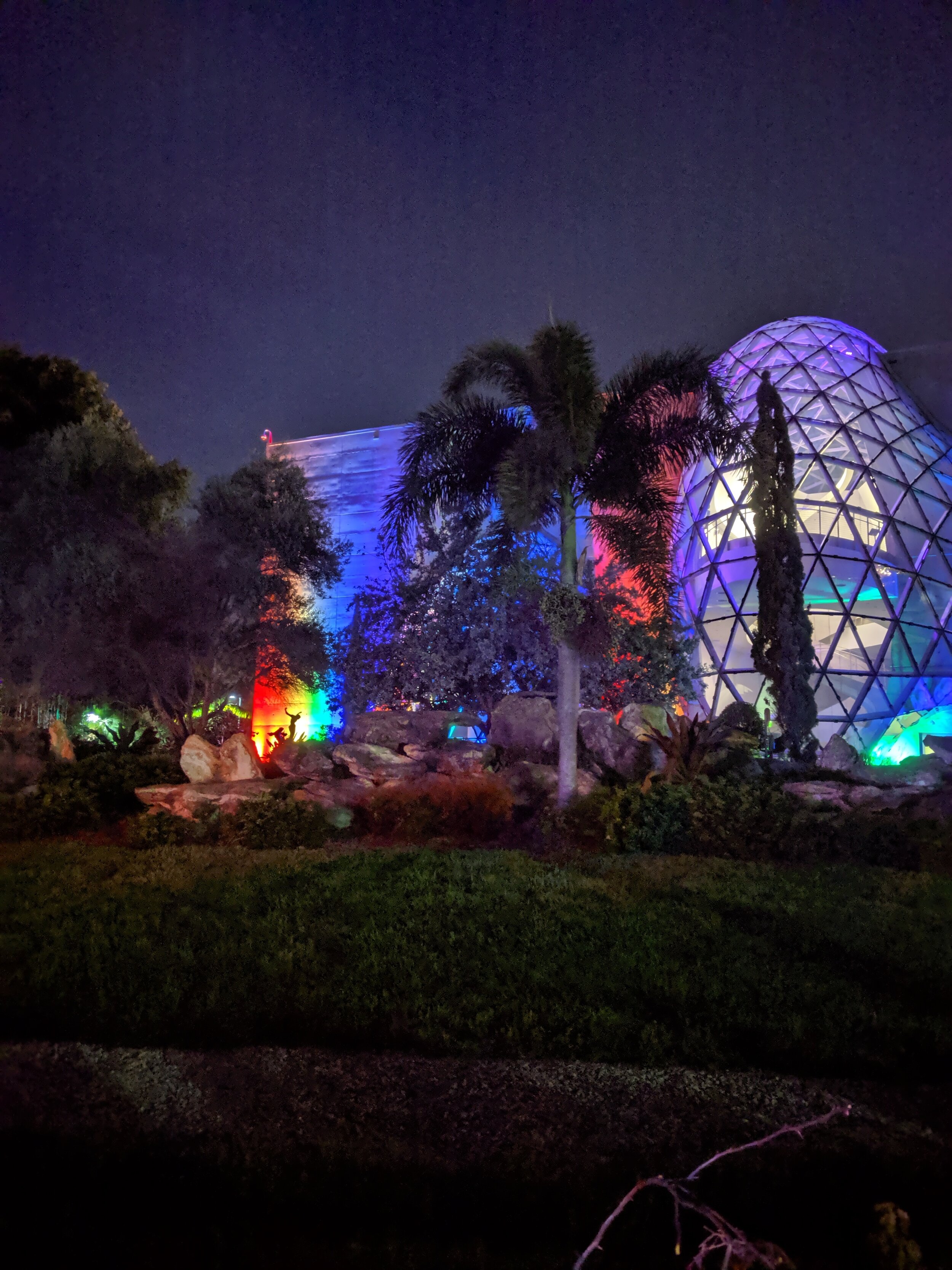  The iconic Dalî museum in St Petersburg Florida lit up in rainbow colors at night. 
