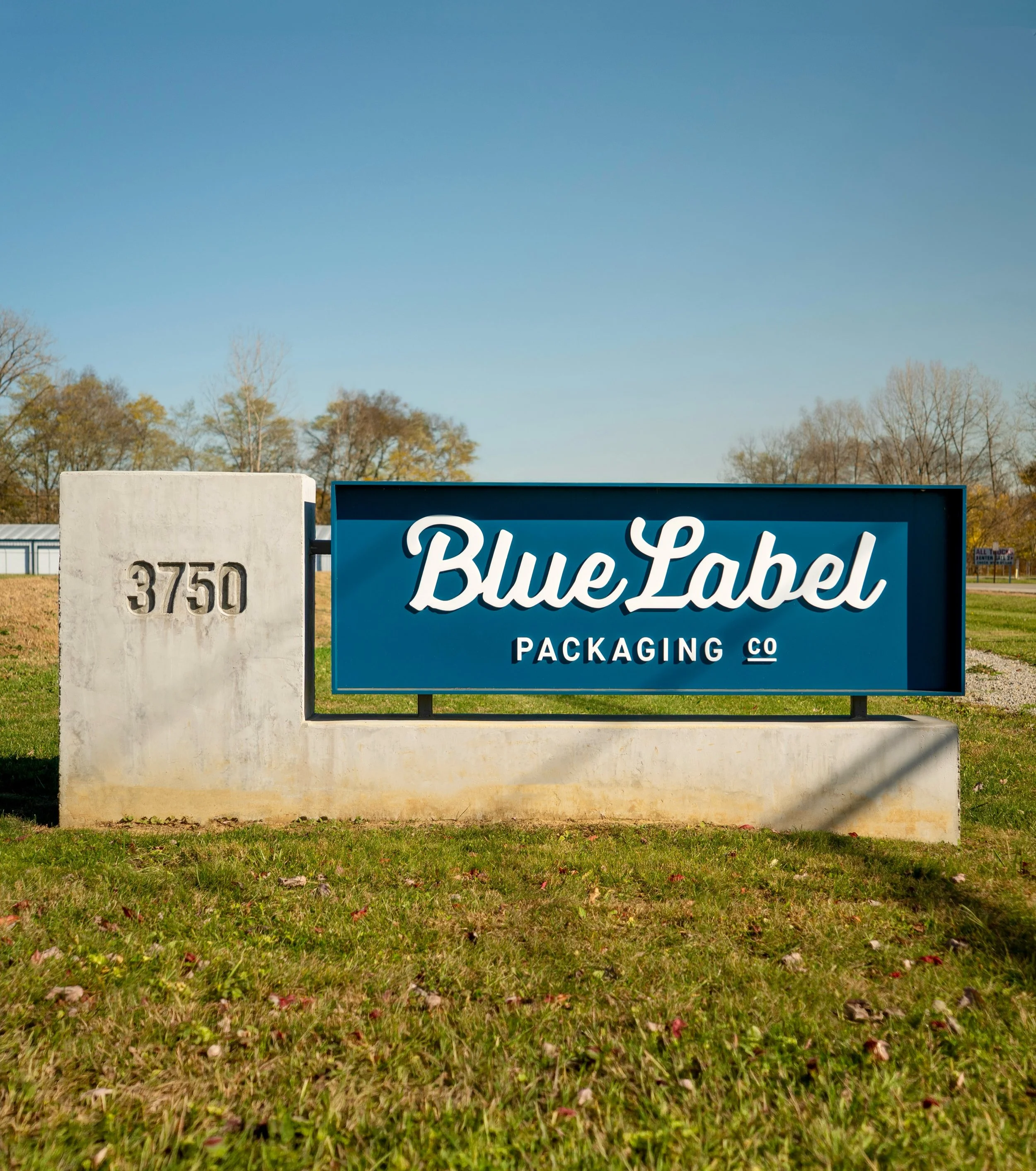 Seeing your logo designs as signage never gets old. These, for @bluelabelpackaging in Lancaster, Ohio. 
.
#signage #bluelabel #logodesign #packaging #design