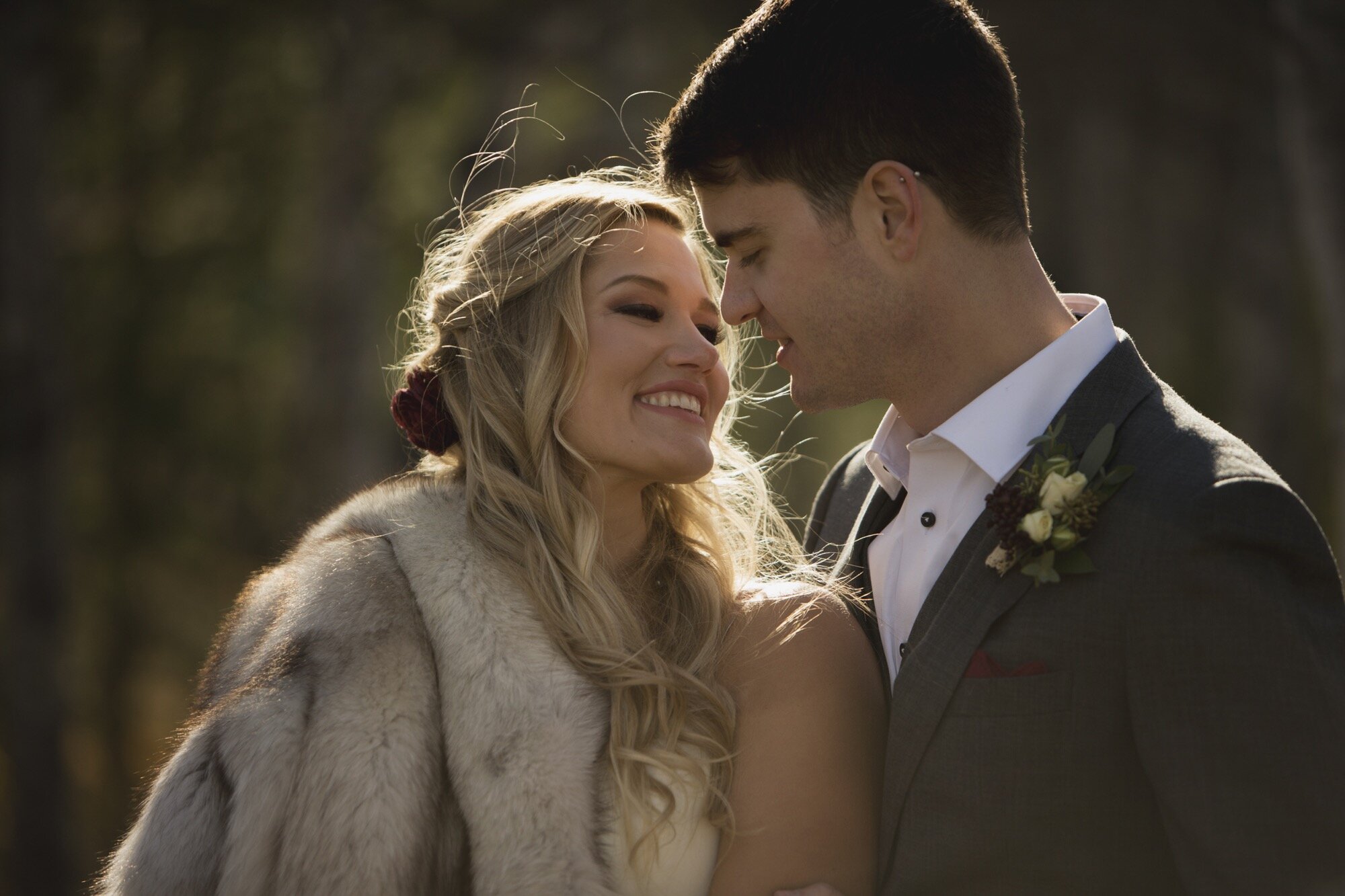 happy bride groom portrait canmore.jpg