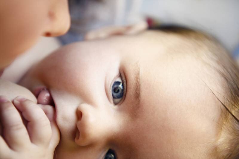 calgary newborn photography closeup blue eyes.jpg