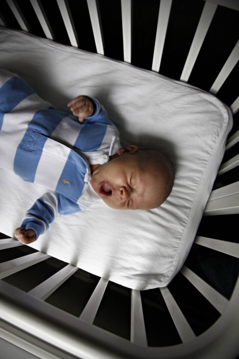bliss photographic newborn photographer crib stripes.jpg