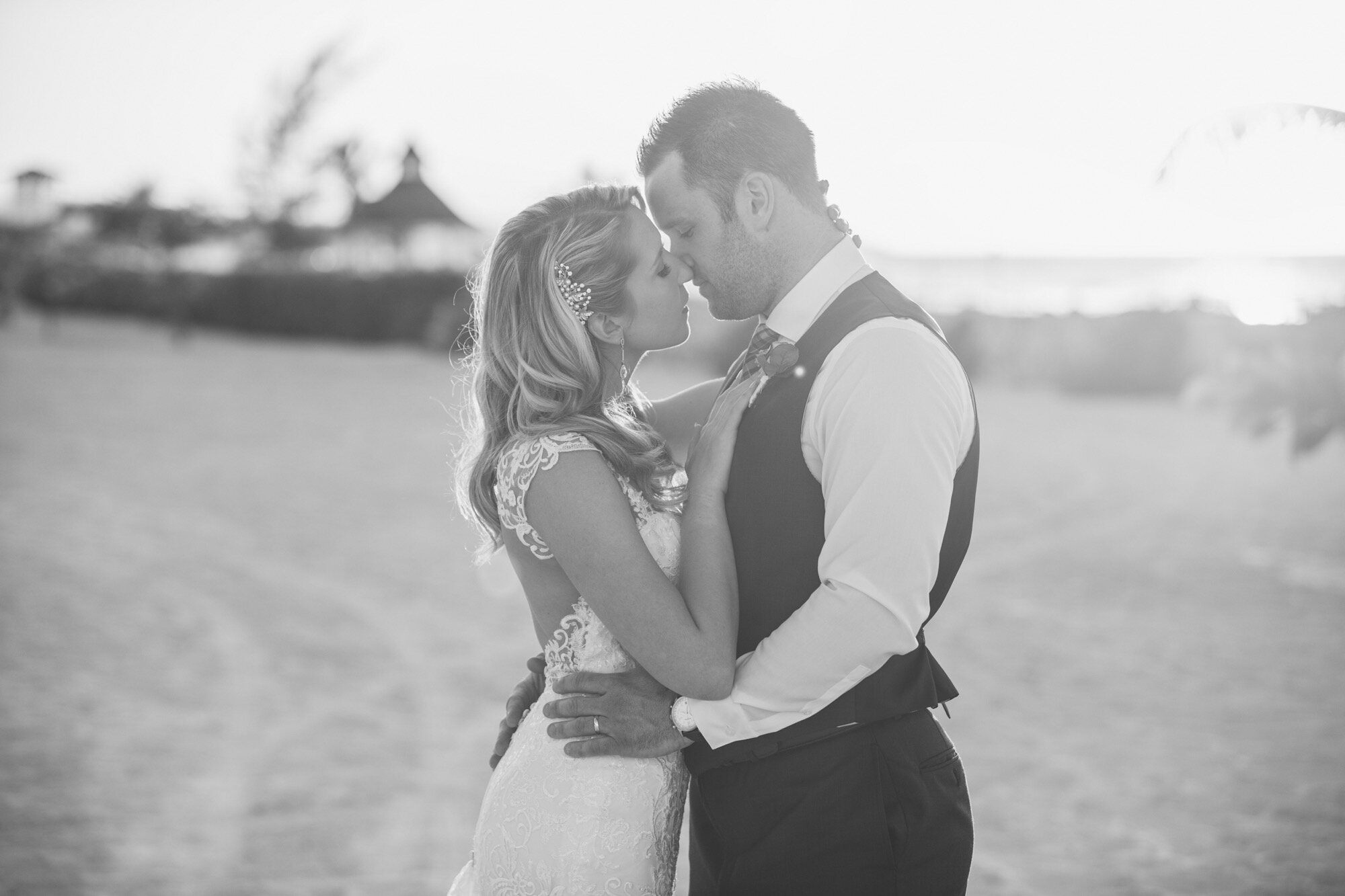 bride groom romantic kiss beach Jamaica.jpg