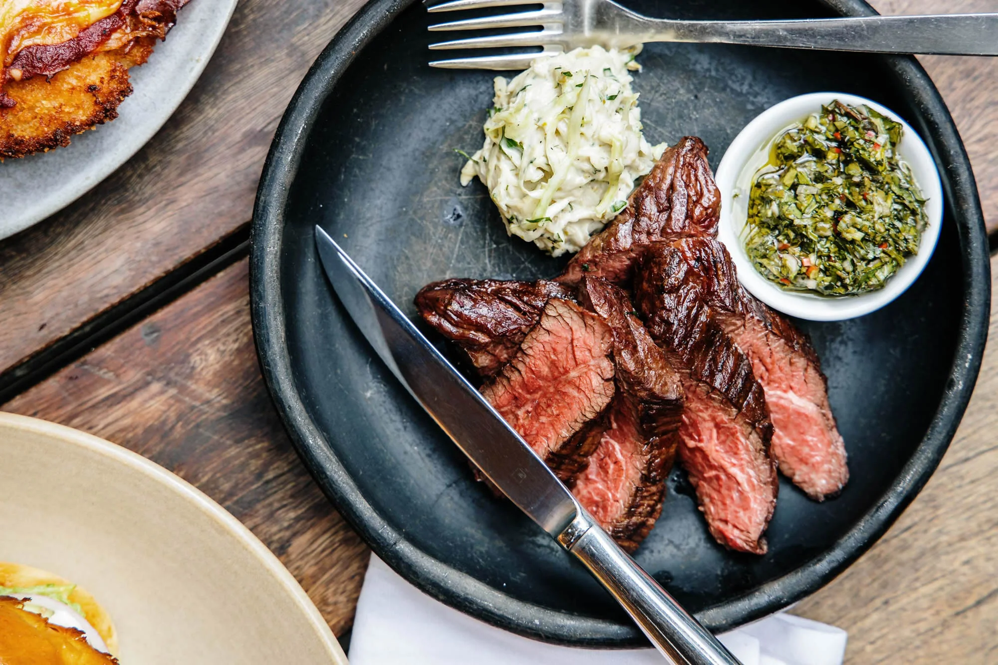 Perfectly cooked steak served with sides