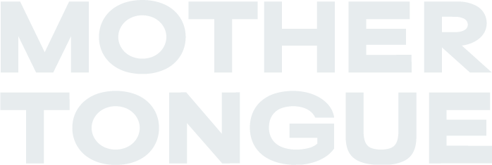 Text reading 'Mother Tongue' in bold, black and gray letters on a white background.