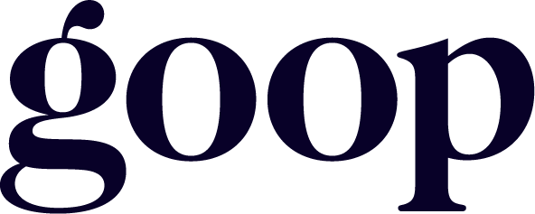 Close-up of the word 'gqop' in large, dark purple letters on a black background.