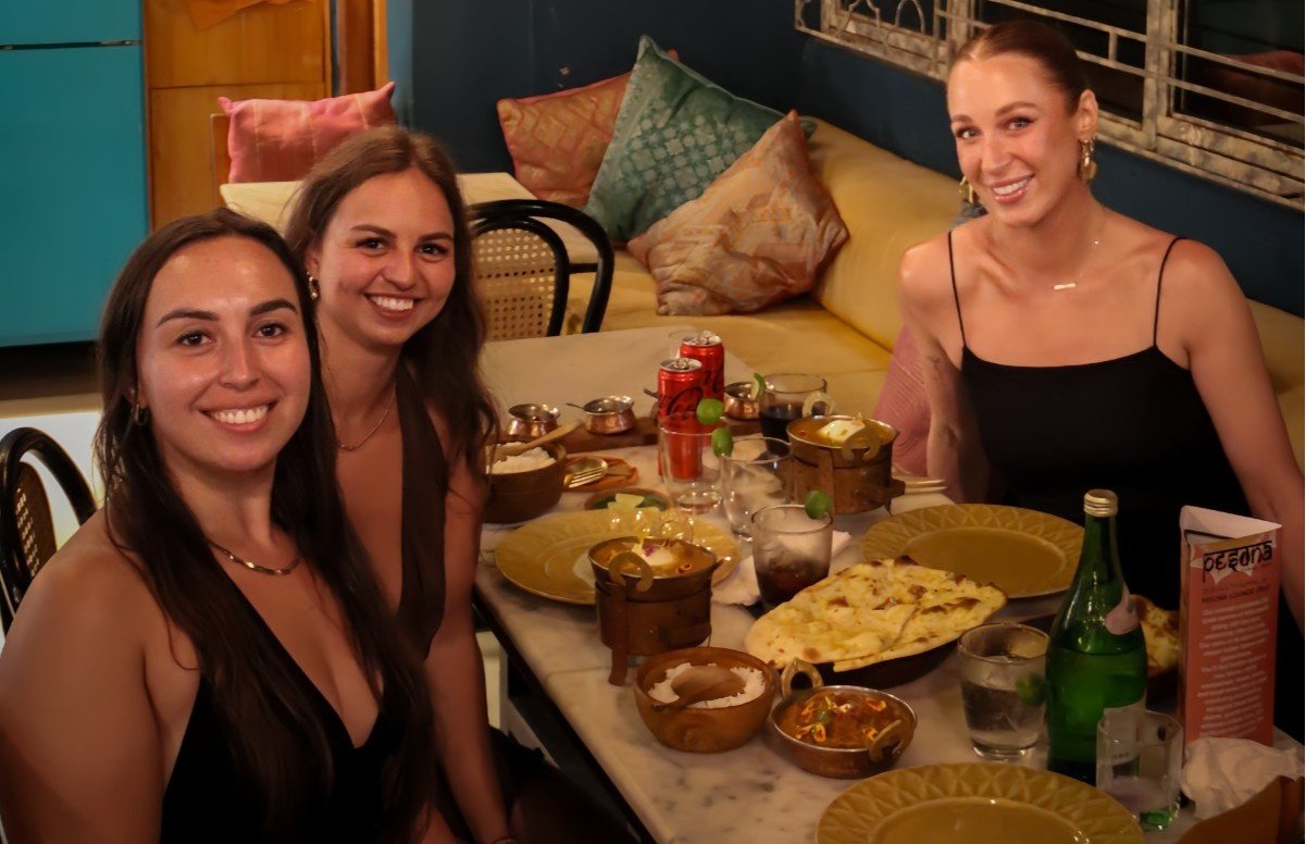 Guests enjoying dinner together at Pesona Lounge in Ubud.