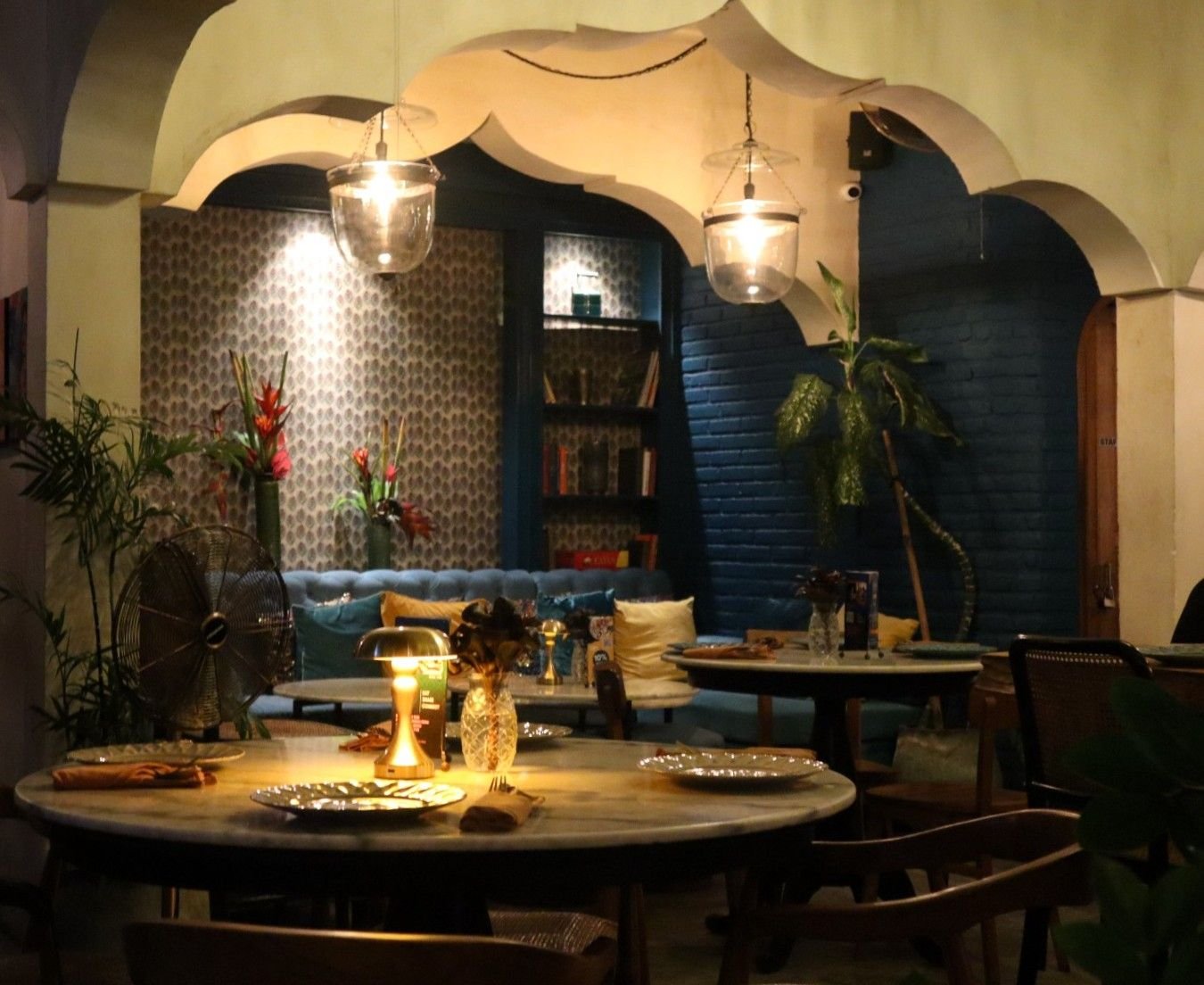 Cozy indoor dining area at Pesona Lounge Ubud, a halal-friendly Indian restaurant in Ubud.