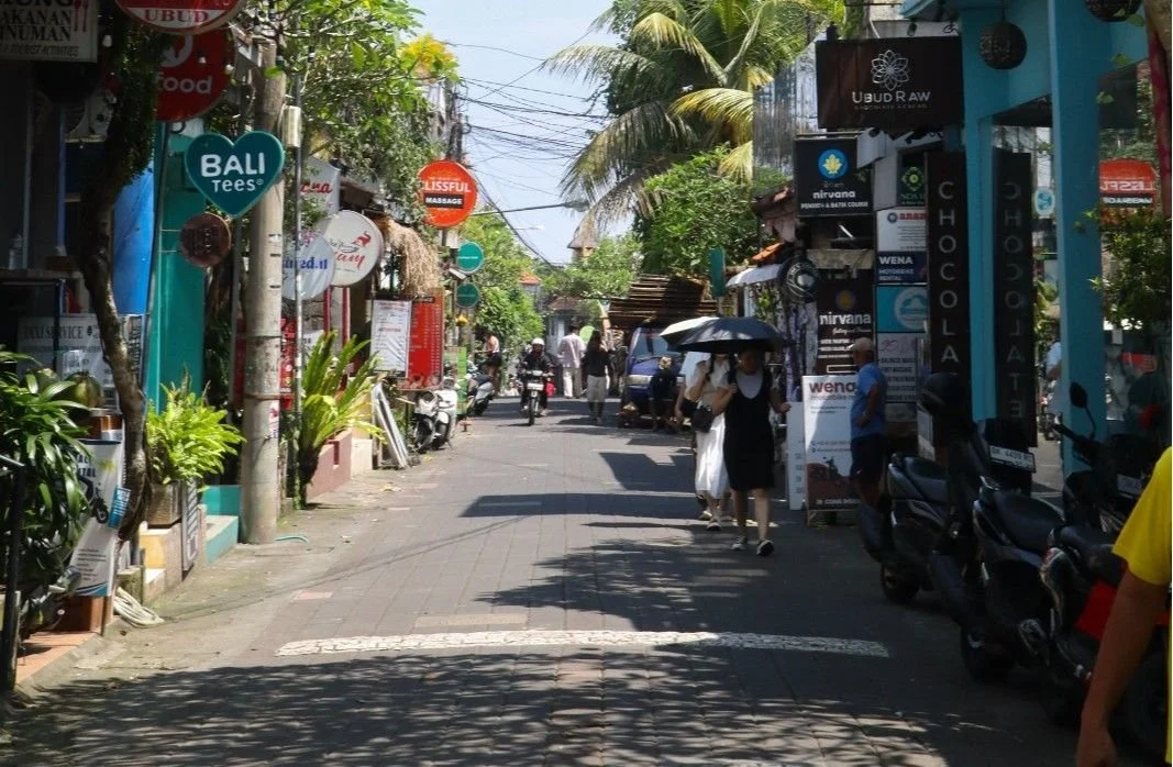 Jalan Goutama in Central Ubud, a popular street filled with restaurants, cafés, and local dining spots near Monkey Forest.