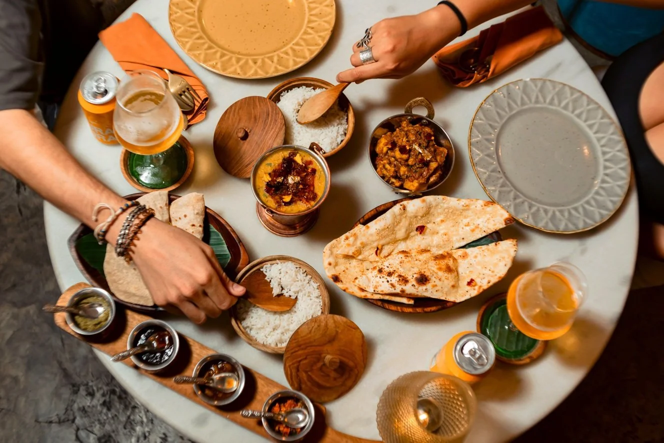 people sharing indian food at pesona lounge ubud