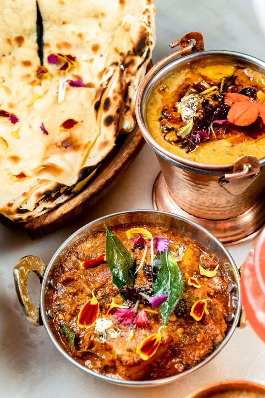 chicken tikka masala side with homemade naan and mung dal tadka
