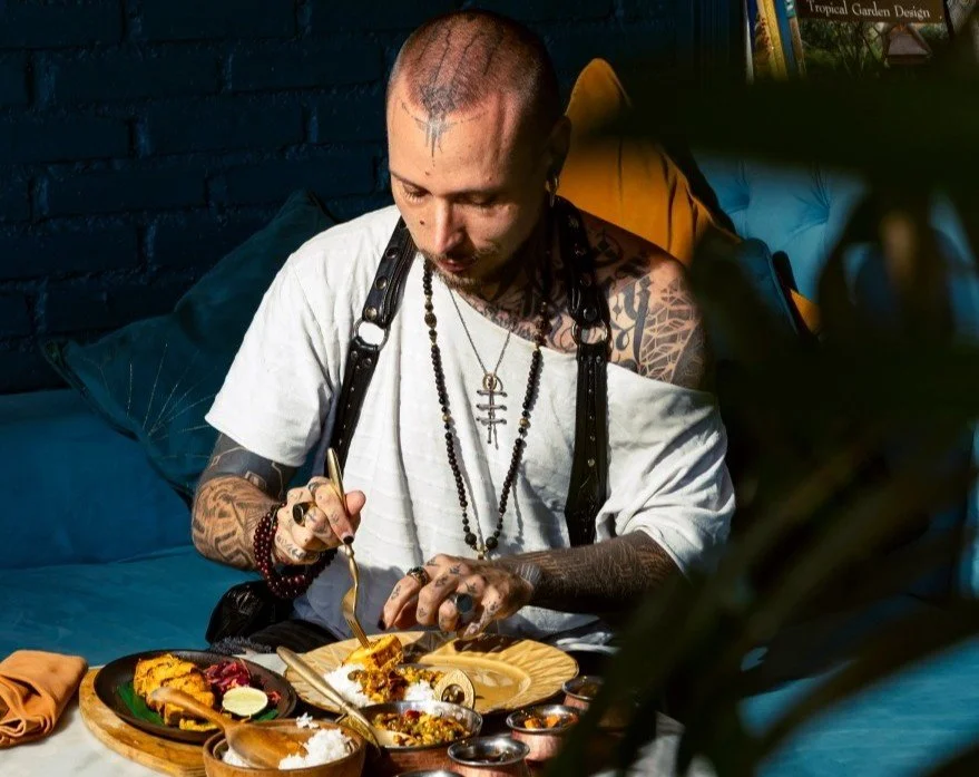 Guest enjoying a selection of Indian dishes at Pesona Lounge Ubud in Bali.