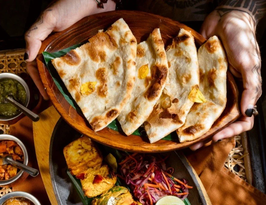 Freshly baked garlic naan served warm at Pesona Lounge, an authentic Indian restaurant in Ubud.