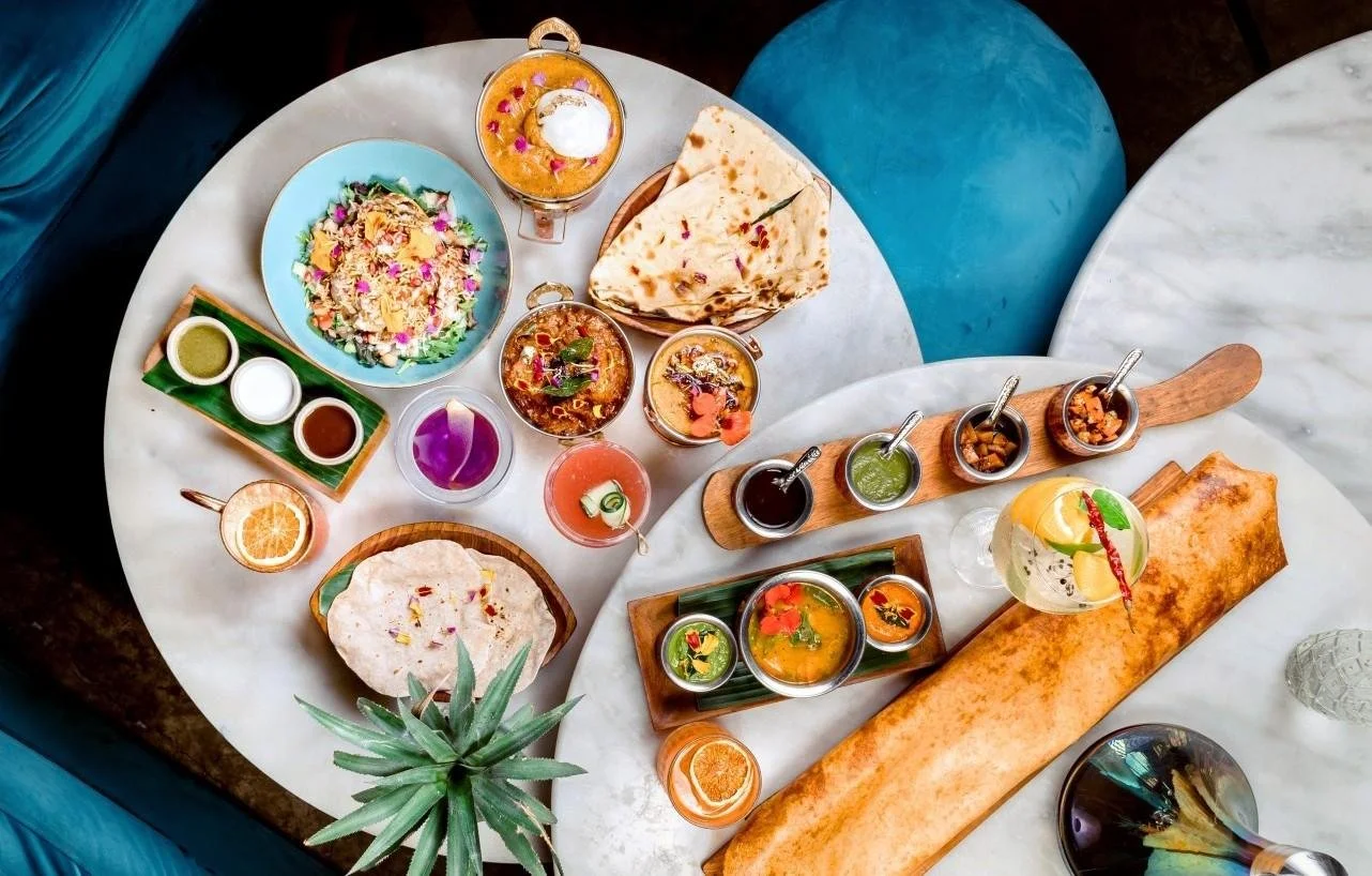 Selection of Indian dishes served for sharing at Pesona Lounge Ubud.
