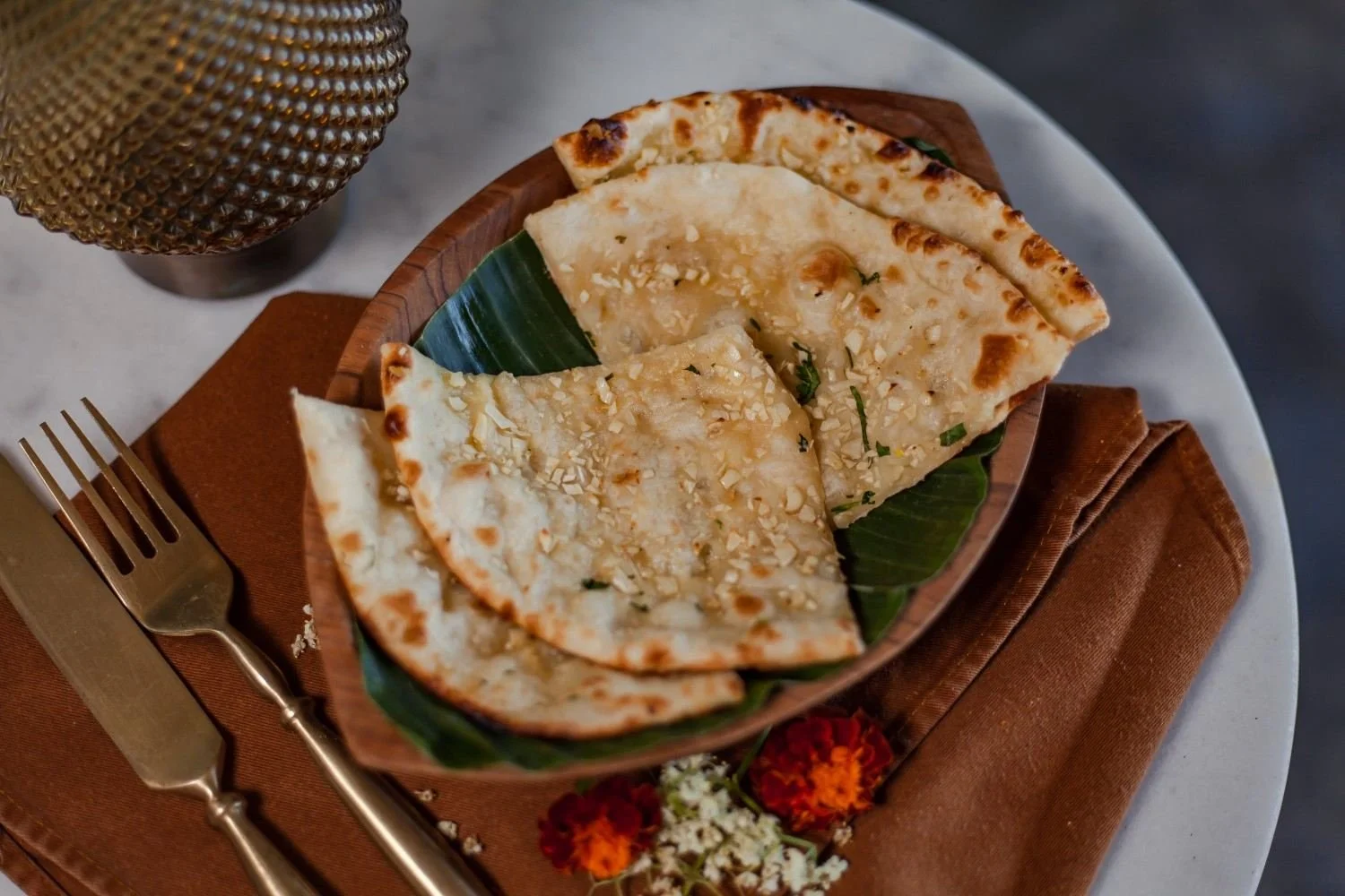 Garlic cheese naan freshly baked in a traditional style at Pesona Lounge Ubud.